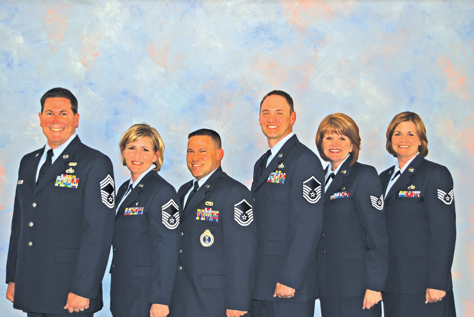 FROM LEFT: Chief Master Sgt. Stephen Plante, Senior Master Sgt. Kathleen Mc-
Cool, Master Sgt. Christopher McCool, Master Sgt. Brian Jolly, Tech. Sgt. Barbara
Plante and Staff Sgt. Kathryn Jolly are family members whose combined service spans five decades and includes all NCO ranks. (Courtesy Photo)