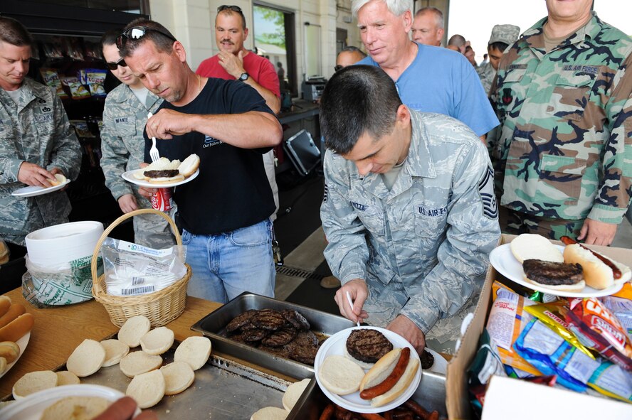 The 106th Mission Support Group at F.S. Gabreski, N.Y, held the first in a series of three cooking Throwdowns on June 18, 2010. The competition between the Force Support Squadron (FSS) and the Logistics Readiness Squadron (LRS) featured hamburgers and hotdogs uniquely topped by squadron. A panel of three judges made up of various Wing members taste tested the food and determined that FSS won best hotdog and LRS won best hamburger. The next Throwdown will be July 31st, 2010, and feature pasta.
(U.S. Air Force Photo / Staff Sgt. David J. Murphy / Released)

