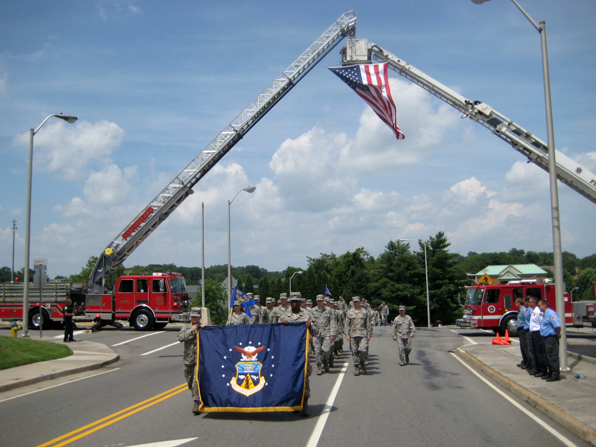 MARYVILLE, Tenn. -- The students and instructors of Airman Leadership School Class 10-4 at The I.G. Brown Air National Guard Training and Education Center, McGhee Tyson Air National Guard Base, march in the Proud to be an American festival in downtown Maryville, June 13, 2010.  (U.S. Air Force photo by Col. Richard B. Howard/Released)