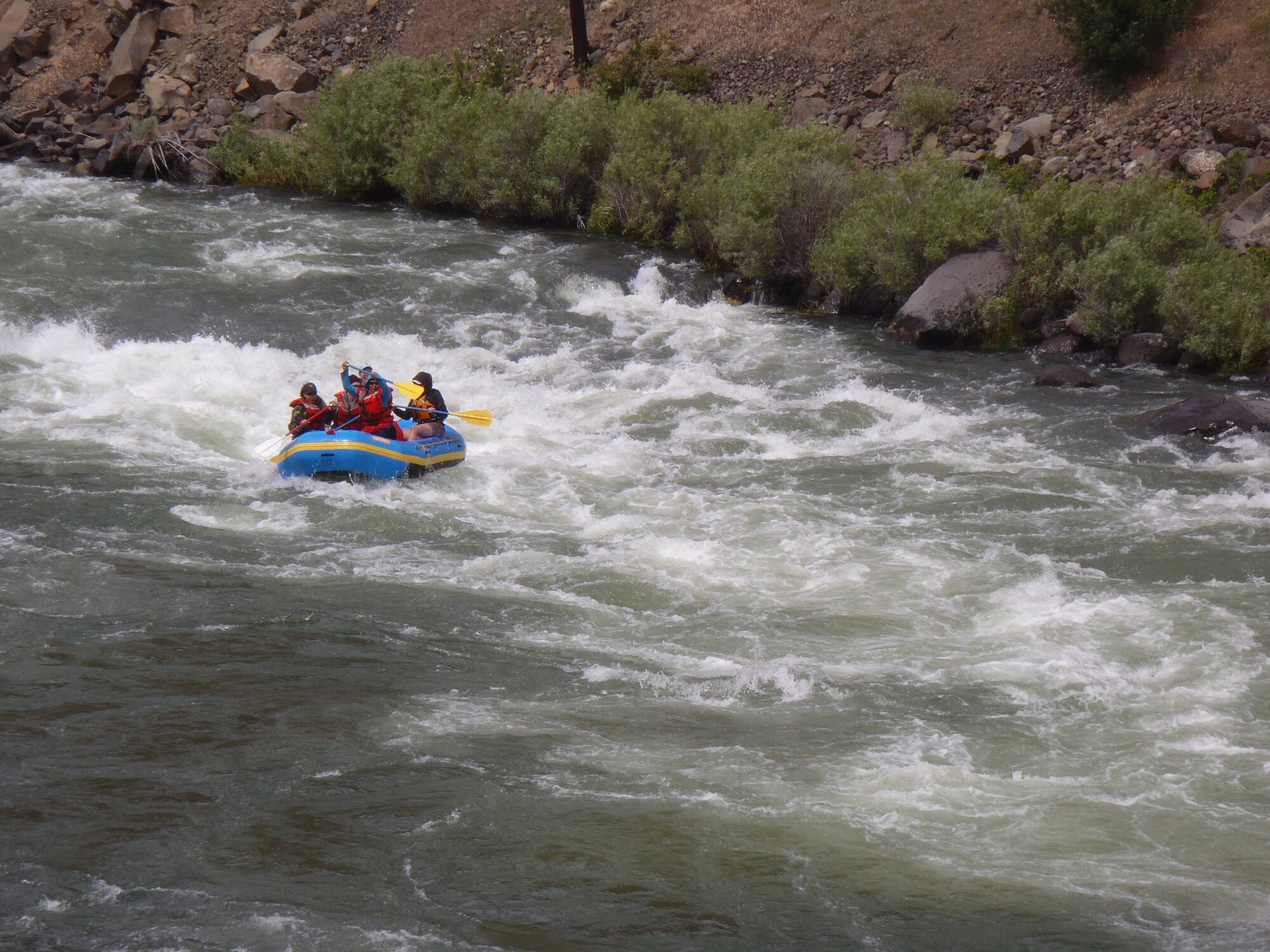 Outward Bound students learned to navigate and captain through Class III, and IV rapids while on a free Outward Bound whitewater rafting, veterans expedition located on the Lower Deschutes River, OR, June 6 to 10. (photo by Scott A. Fessenden).