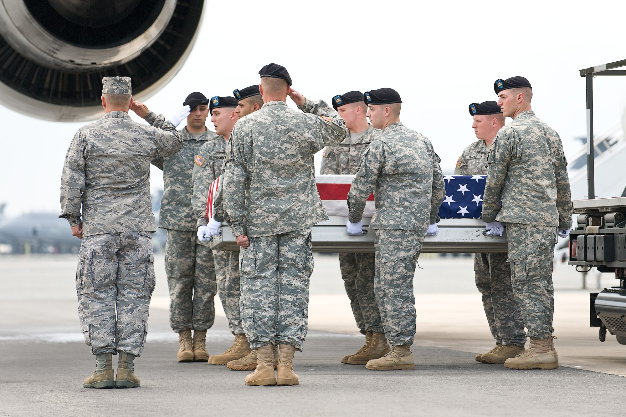 A U.S. Army carry team transfers the remains of Army Spc. Brian M. Anderson, of Harrisonburg, Va., at Dover Air Force Base, Del., June 14. (U.S. Air Force photo/Roland Balik)