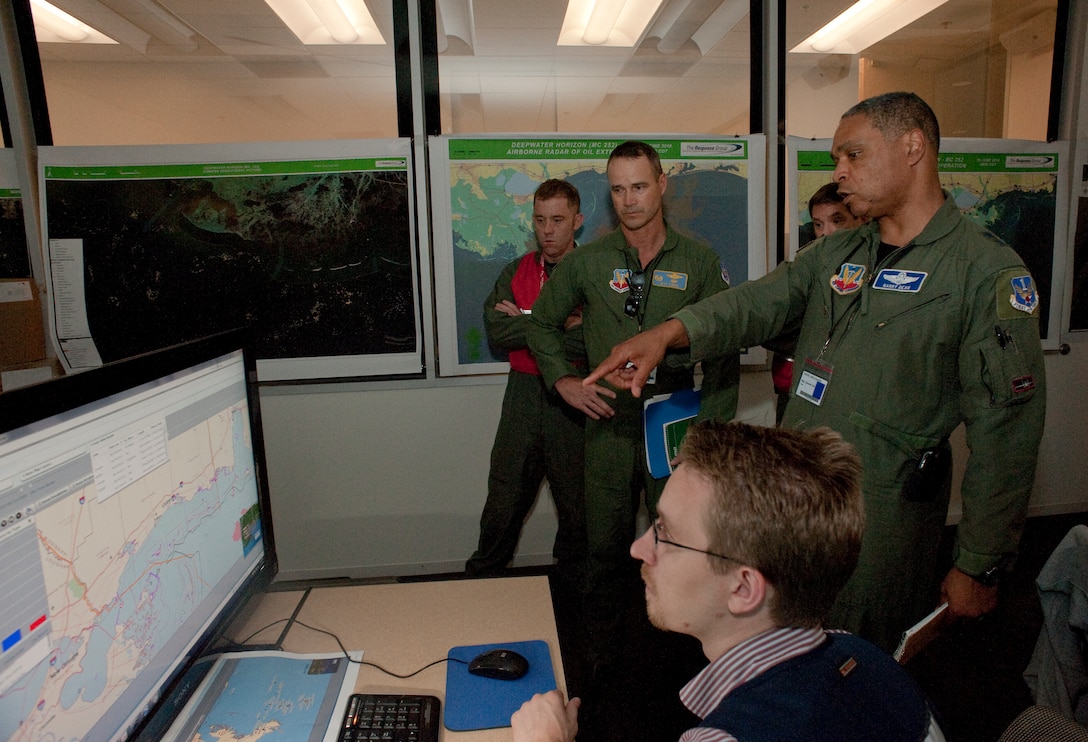 HOUMA, La. - Maj. Gen. Garry Dean, the joint force air component commander for North American Aerospace Defense Command and U.S. Northern Command, discusses the current response to the Gulf oil spill at the Houma Incident Command Post, June 15, 2010. Dean and others spoke together in order to coordinate the air space and assets for the oil spill response. U.S. Coast Guard photo by Petty Officer 3rd Class Robert Brazzell. 