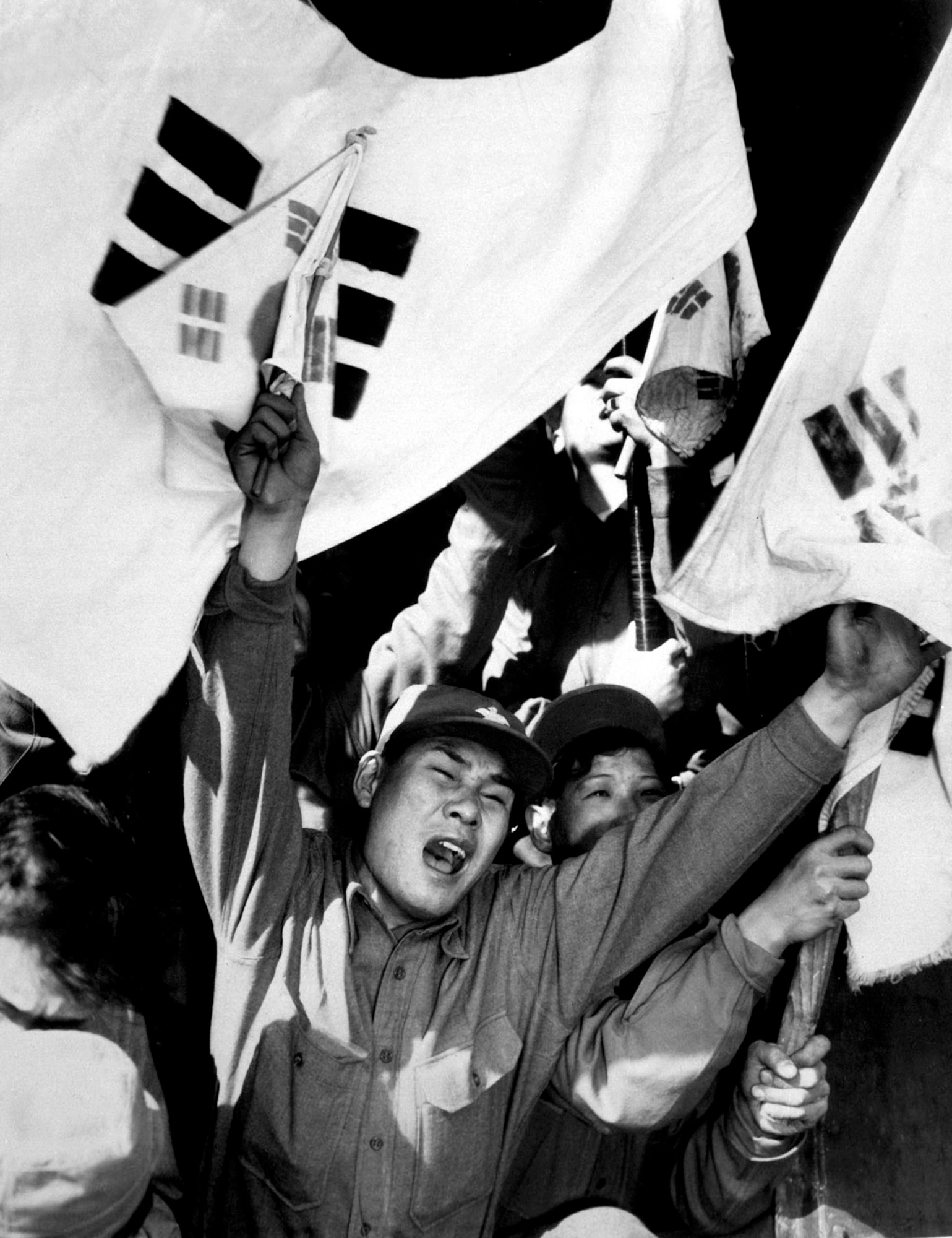 A former North Korean soldier shouts for joy upon reaching Seoul, South Korea, and freedom. Many North Korean and Chinese POWs renounced communism and chose to be released to new lives in South Korea and Taiwan. (U.S. Air Force photo)