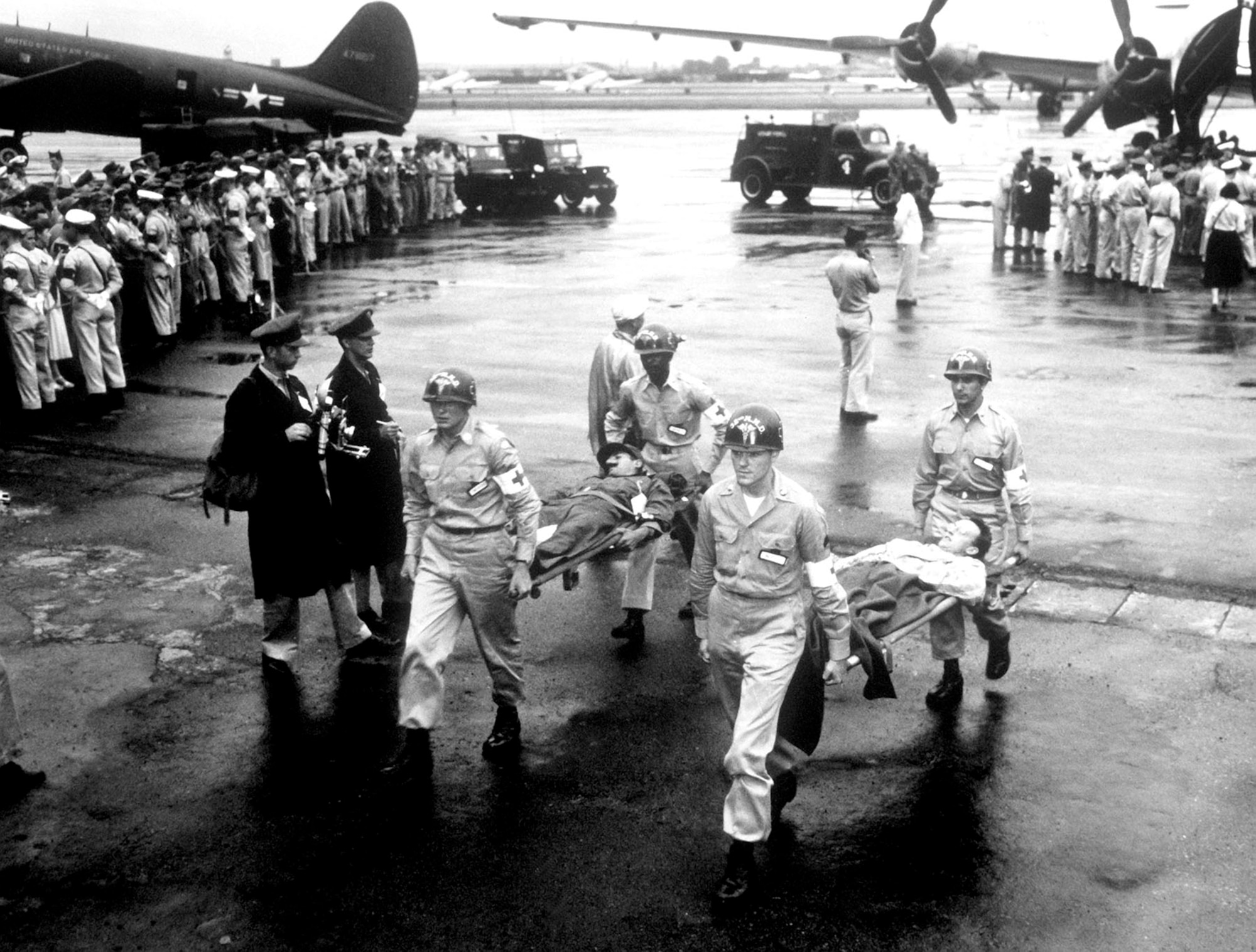 Many POWs required immediate medical care upon release. These exchanged prisoners are arriving at Tachikawa Air Base, Japan, in August 1953. (U.S. Air Force photo)