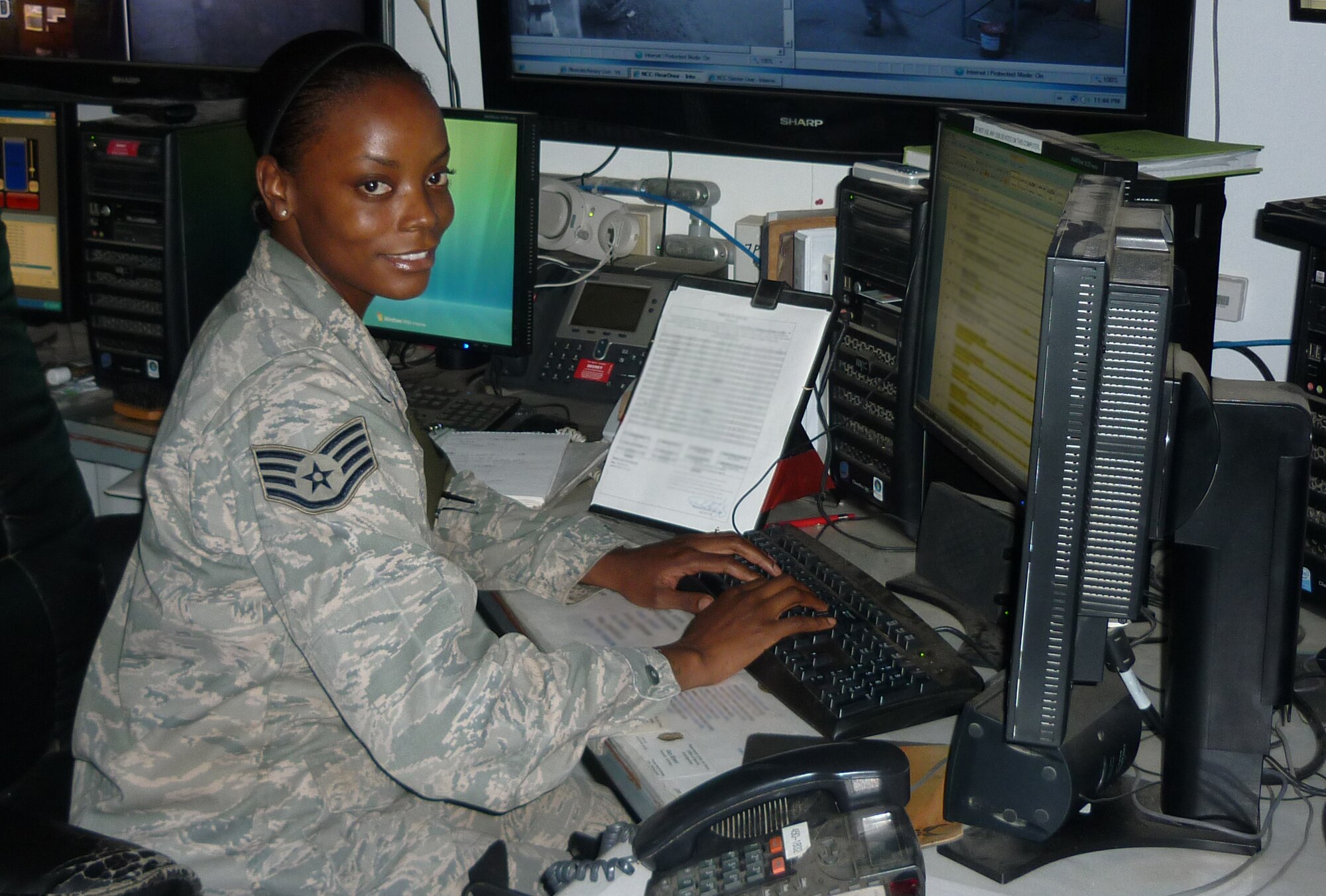 U.S. Air Force Staff Sgt. Mika Byrd, 387th Expeditionary Security Forces Squadron Base Defense Operations Center controller, is deployed from the 100th Security Forces Squadron at Royal Air Force Mildenhall, England. (U.S. Air Force photo illustration/Released)
