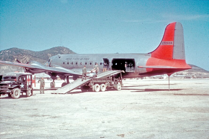 U.S. Airmen load American and Allied casualties onto a U.S. Air Force C-54D at Taegu, Korea, 1951. (U.S. Air Force photo)