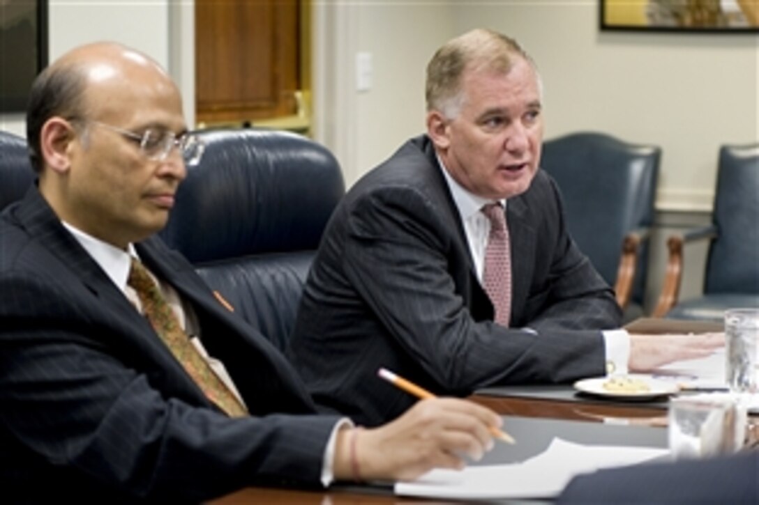 U.S. Deputy Defense Secretary William J. Lynn III hosts the India-U.S. Forum of Parlimentarians at the Pentagon, June 18, 2010.   Abhisek Singhvi, member of Parliment and the chairman of the India-U.S. Forum of Parlimentarians, left, takes notes. 