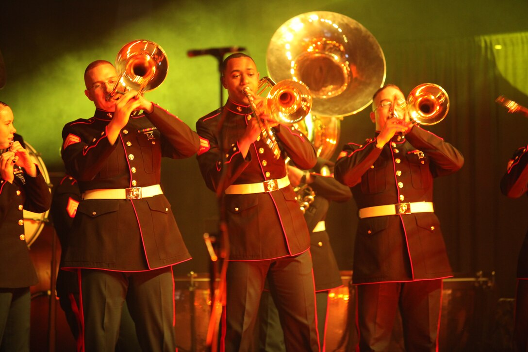 Corporals Allen Cormier, Edward Miller and David Atkinson capture the crowd’s attention with a brass interlude. Marine Band New Orleans gave a holiday performance at the Alario Center, Dec.10, to help build support of the Toys for Tots program.
