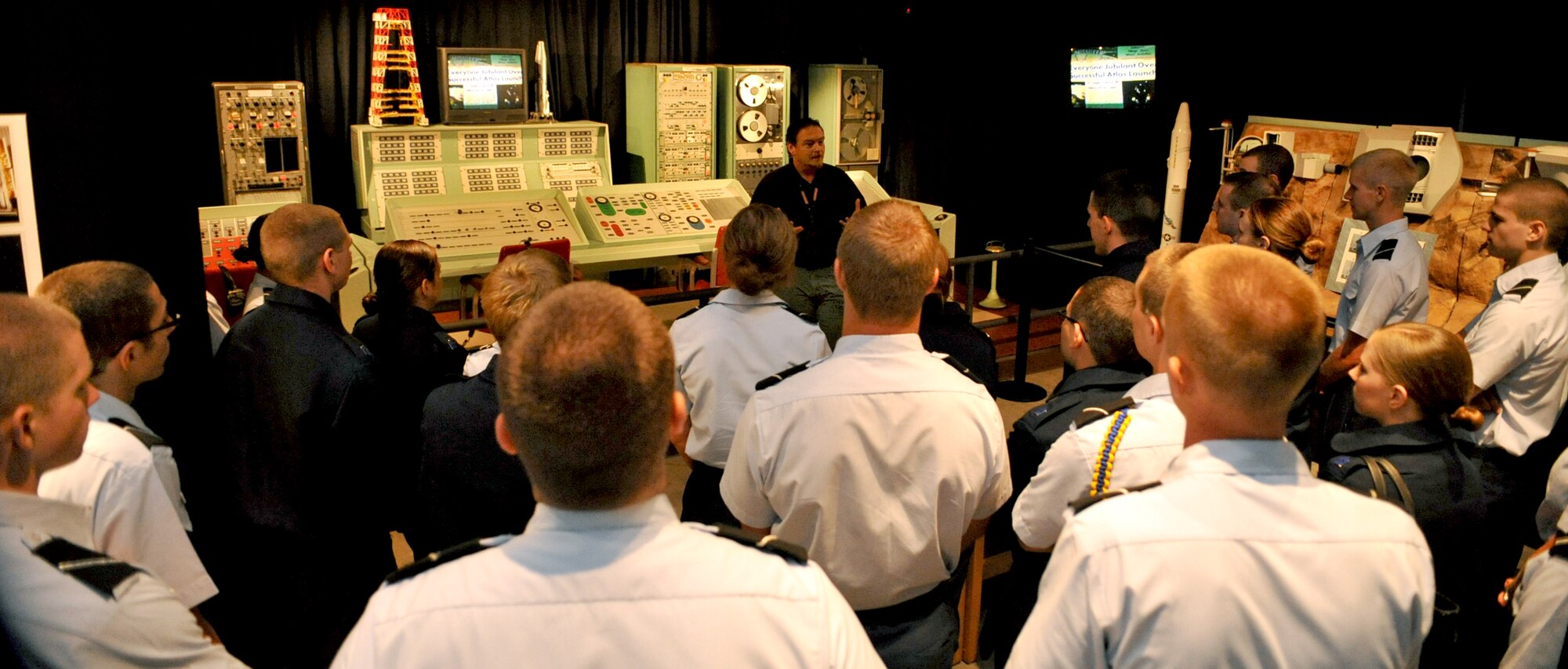 VANDENBERG AIR FORCE BASE, Calif. -- Reserve Officers Training Corps Cadets, listen to Jay Prichard as he briefs them on the history of Vandenberg at the Heritage Museum here Monday, June 14, 2010. The ROTC cadets will be touring the training squadrons and space launch facilities. (U.S. Air Force photo/ Senior Airman Andrew Lee)