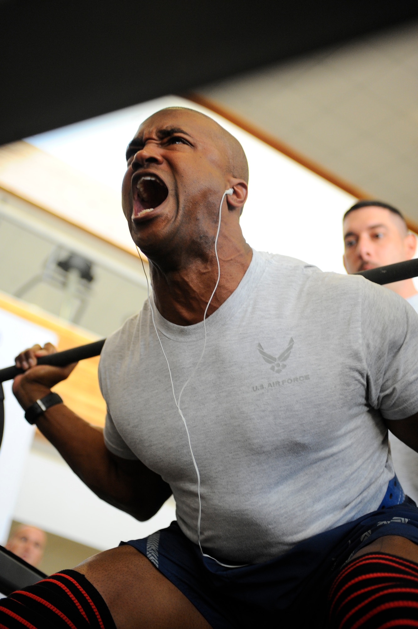 HOLLOMAN AIR FORCE BASE, N.M. -- Master Sgt. Antoine Washington, 49th Force Support Squadron, performs a squat during a Powerlifting Competition at the Domenici Fitness and Sports Center June 11, 2010. More than 15 Airmen competed in nine different weight categories. Sergeant Washington took home first place for overall heavyweight in the 185 to 205 weight class. (U.S. Air Force photo by Airman 1st Class Veronica Stamps / Released)