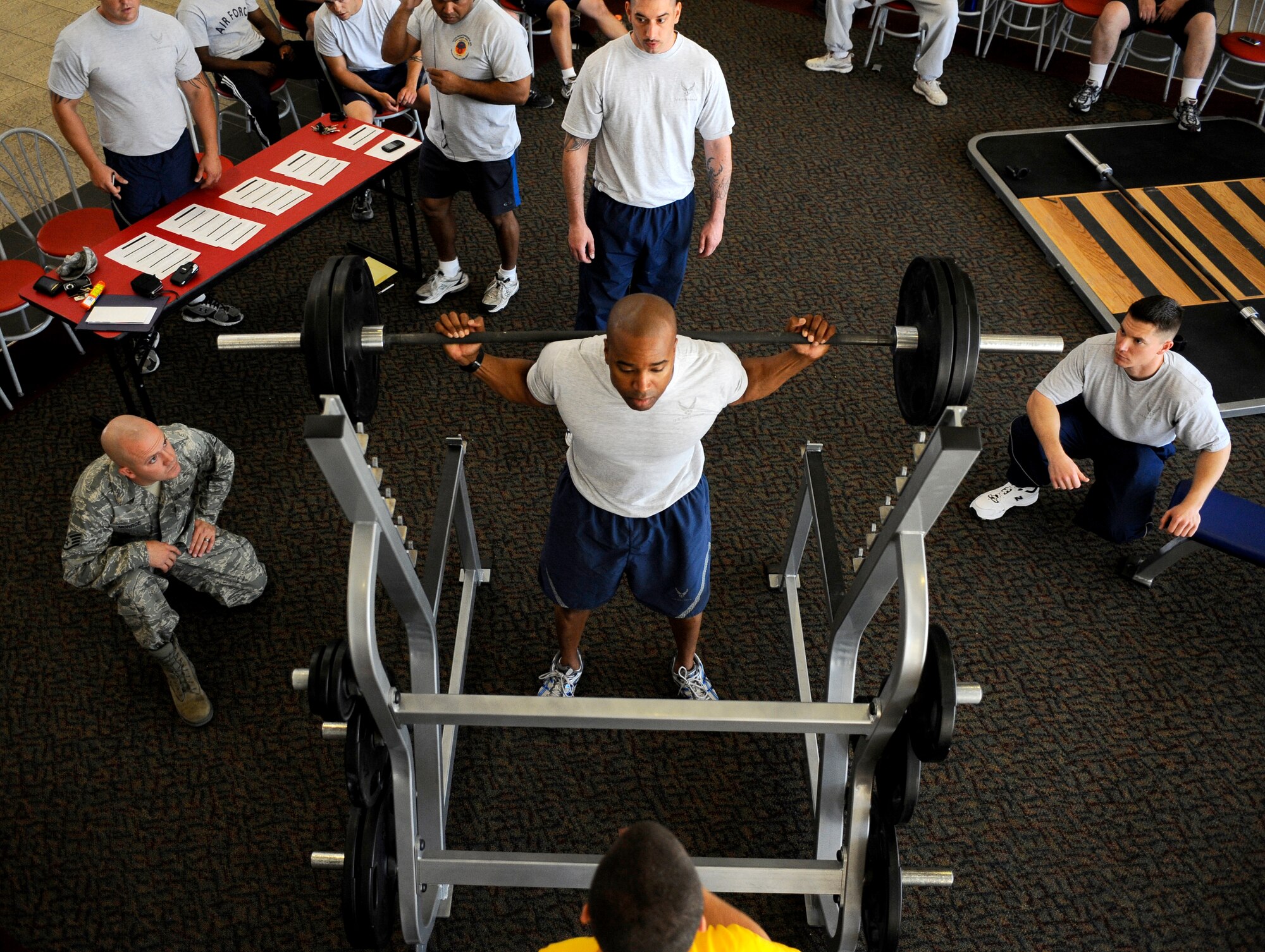 HOLLOMAN AIR FORCE BASE, N.M. -- Master Sgt. Antoine Washington, 49th Force Support Squadron, performs a squat during a Powerlifting Competition at the Domenici Fitness and Sports Center June 11, 2010. More than 15 Airmen competed in nine different weight categories. After competing in the dead lift, squat and bench press, Sergeant Washington took the title of overall heavyweight. (U.S. Air Force photo by Airman 1st Class Veronica Stamps / Released)