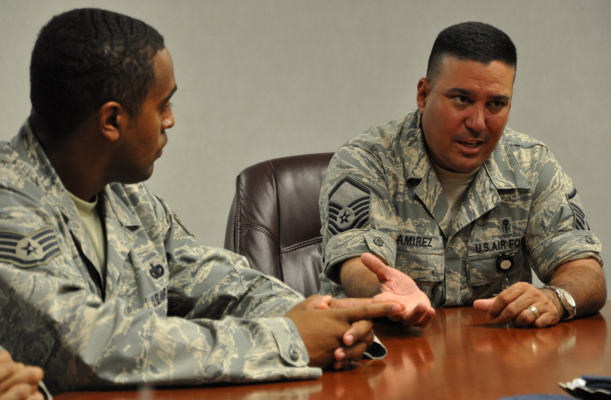 LAUGHLIN AIR FORCE BASE, Texas – Master Sgt. Miguel Ramirez, acting 47th Medical Group first sergeant, advises Staff Sgt. Jovonnie Walter, 47th Security Forces Squadron, and other enlisted personnel who were recently promoted to technical sergeant about what will be expected from them and what they can expect once their promotion is complete. A total of six Laughlin members were promoted to technical sergeant. (U.S. Air Force photo by Airman 1st Class Blake Mize) 