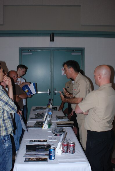 Local reserve recruiters from both the Navy and Air Force were available to answer questions from the 250 attendees June 12 at Naval Air Station Fort Worth Joint Reserve Base, Texas. According to 301st Fighter Wing recruiters, it is normal for them to get recruitment leads from an average 10% of the muster attendees, and mostly from active duty members. This event gave the recruiters a record 24% of attendee leads. The recruiters reported this as the highest lead rate ever for their mass musters.(U.S. Air Force Photo/TSgt Shawn David McCowan)