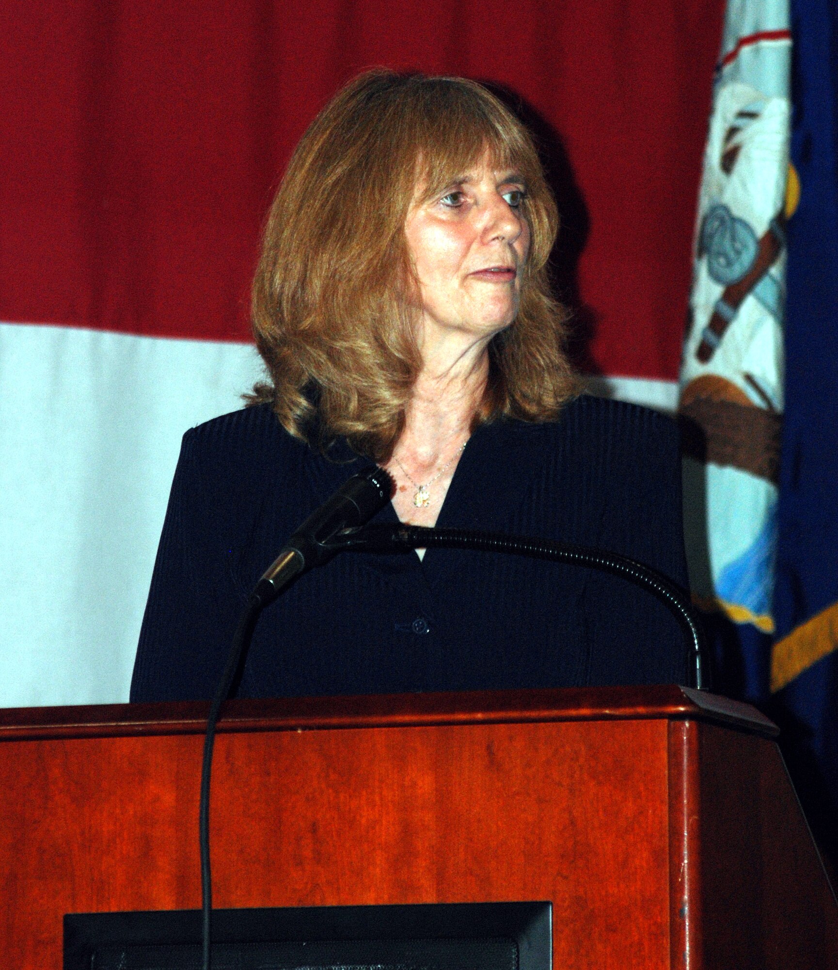 Sherrie Briggs, chief of plans and programs, Air Reserve Personnel Center, addressed about 250 attendees June 12 at Naval Air Station Fort Worth Joint Reserve Base,
Texas, to show support for the first joint Reserve mass muster for the
Individual Ready Reserve. (U.S. Air Force Photo/TSgt Shawn David McCowan)