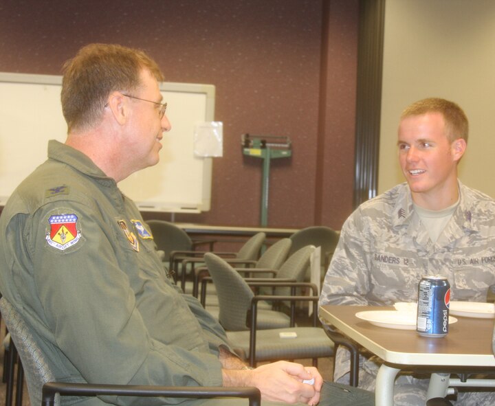 WRIGHT-PATTERSON AIR FORCE BASE, Ohio – Air Force Academy Cadet Matt Sanders talks with Col. Stephen Goeman, 445th Airlift Wing commander, during a mentoring session conducted by officer and enlisted reservists in various career fields assigned to the 445th Airlift Wing June 12.  Cadet Sanders visited the wing and the base as part of Operation Air Force, a three-week summer program through which cadets gain “real Air Force” experience during stays at Air Force bases across the country.  (U.S. Air Force photo/Senior Airman Mikhail Berlin)
