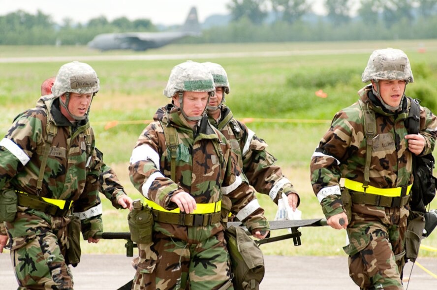 Guardsmen from the 241st Air Traffic Control Squadron, 139th Airlift Wing, Missouri Air National Guard, St. Joseph, carry a stretcher as they condut an Operational Readiness Inspection (ORI) on Saturday, June 12, 2010.  The squadron has been preparing for the ORI for over four months.  (U.S. Air Force photo by MSgt. Shannon Bond/Released)