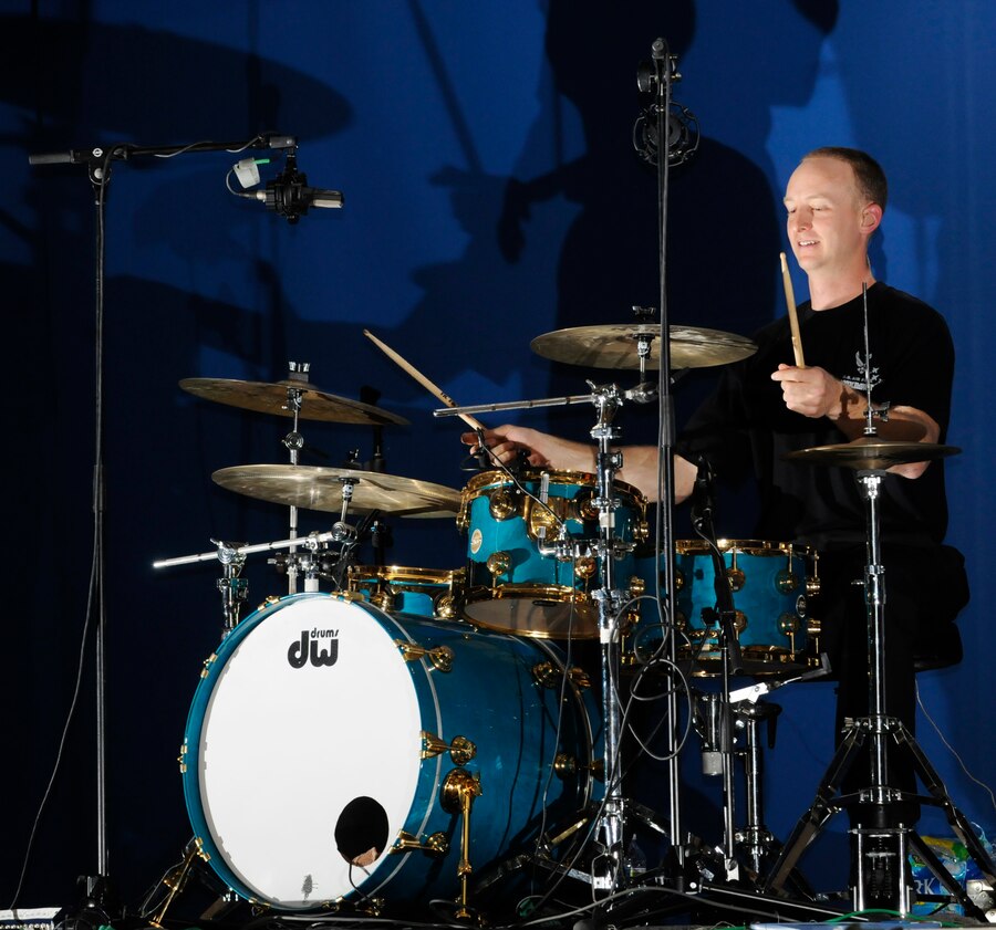 Master Sgt. Dennis Hoffmann, United States Air Force Band member, plays the drums as part of the Air Force Band’s rock group element, Max Impact’s performance May 16 at the Joint Service Open House at Andrews Air Force Base, Md. The Open House attracted thousands and featured many attractions to educate the public about the military’s varied missions. (U.S. Air Force photo by Airman 1st Class Katherine Windish)