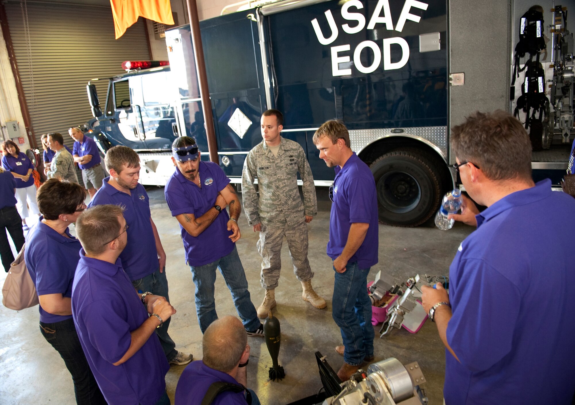 HOLLOMAN AIR FORCE BASE, N.M. -- Members of Leadership Otero check out robots and equipment at the 49th Civil Engineer Squadron Explosive Ordinance Disposal flight during a tour of the base June 9, 2010. Leadership Otero was founded in Alamogordo in 2001 to identify current and emerging leaders, enhance leadership skills and deepen knowledge of challenges and opportunities facing the community. A few members of the 2010 class are members of Team Holloman. (U.S. Air Force photo by Airman 1st Class Sondra Escutia / Released)