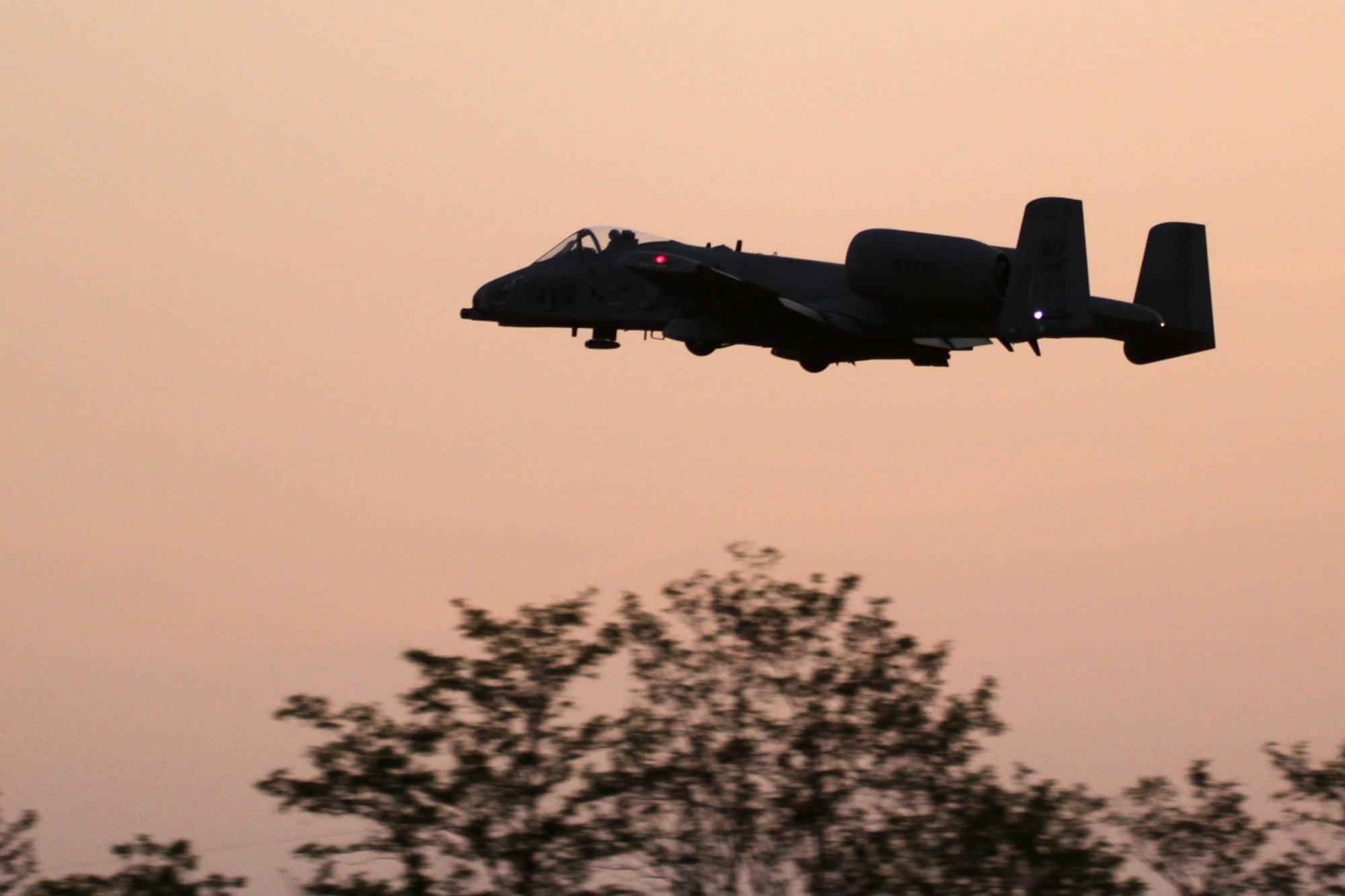 A remotely controlled A-10 Thunderbolt II on a night sortie in Villesse, Italy, April 29, 2010. Italian model builder, Kurt Tötsch constructed the aircraft after a 47th Fighter Squadron jet from Barksdale Air Force Base, La. (Courtesy photo) 