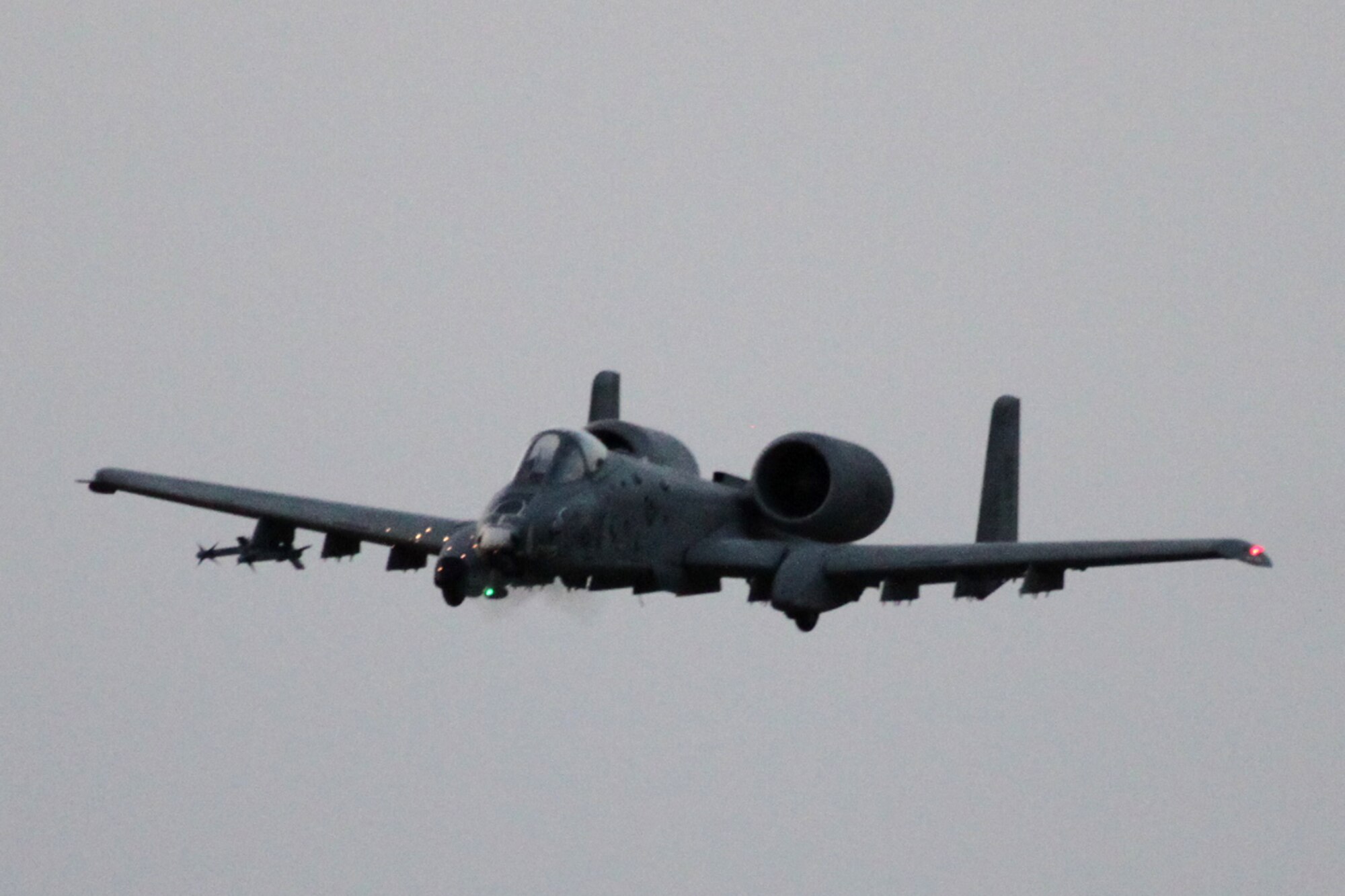 A remotely controlled A-10 Thunderbolt II firing its cannon on a night sortie in Villesse, Italy, April 29, 2010. Italian model builder, Kurt Tötsch constructed the aircraft after a 47th Fighter Squadron jet from Barksdale Air Force Base, La. (Courtesy photo) 