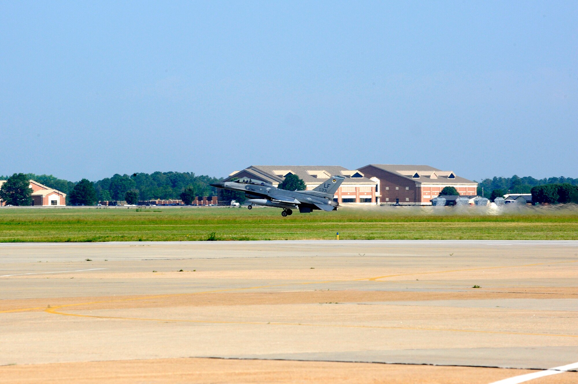 LANGLEY AIR FORCE BASE, Va. -- An F-16 Fighting Falcon from the 62d Fighter Squadron takes off June 10. The squadron is visiting from Luke AFB, Ariz., to provide adversary support, or “red air,” for the 1st Fighter Wing’s F-22 Raptor pilots. (U.S. Air Force photo/Senior Airman Dana Hill)