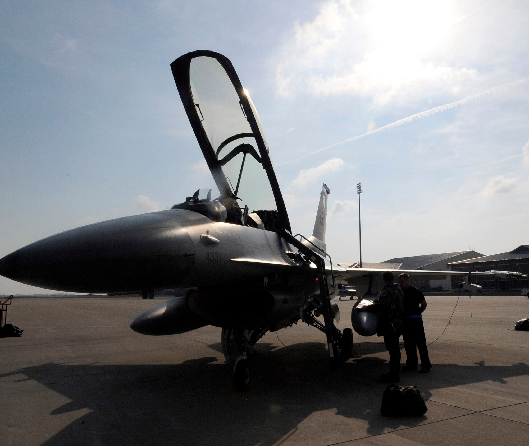 LANGLEY AIR FORCE BASE, Va. -- An F-16 crew from the 62d Fighter Squadron prepares a Fighting Falcon for launch June 10. The squadron is visiting from Luke AFB, Ariz., to provide adversary support, or “red air,” for the 1st Fighter Wing’s F-22 Raptor pilots. (U.S. Air Force photo/Senior Airman Dana Hill)