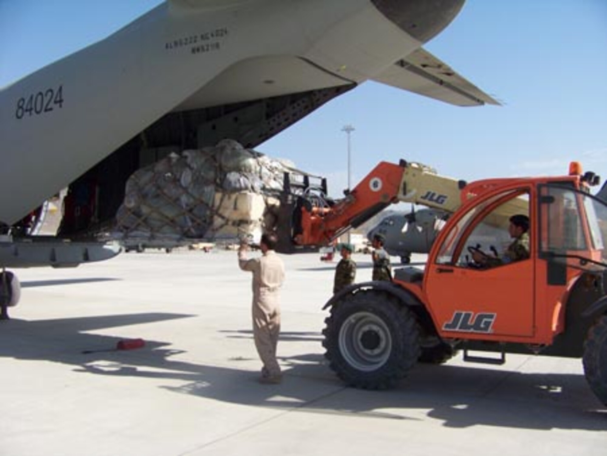 Afghan National Army Air Force soldier Inudin Safi loads a cargo pallet on a C-27A Spartan June 8, 2010, at the Afghan National Army Air Force base in Kabul, Afghanistan (U.S. Air Force photo/Master Sgt. Michael Dow)