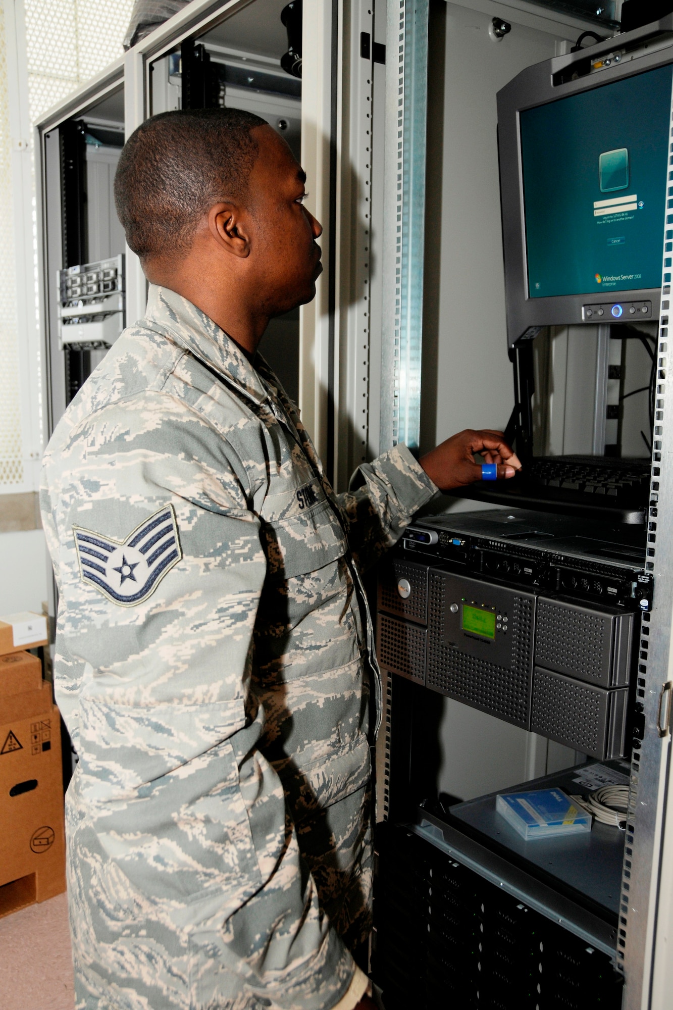 Staff Sgt. JaVonn Stone examines a monitor that displays network functions at the 127th Communications Squadron Network Control Center, June 19, 2010, at Selfridge Air National Guard Base. Stone and other computer specialists in the squadron work as part of a team to ensure that the computer system at Selfridge is reliable and secure. (U.S. Air Force photo by TSgt. Dave Kujawa) (RELEASED)