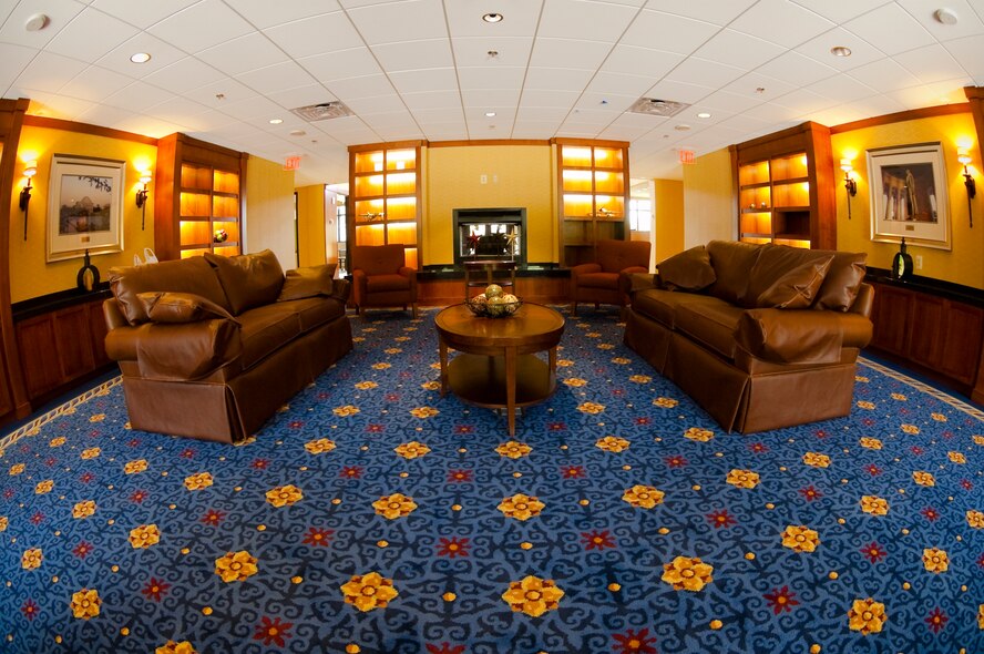 The inviting atmosphere of the Presidential Inn is complete with leather couches, a fireplace and a cafe adjacent to the lobby. The new lodging facility opened its doors to servicemembers and their families here June 11. (U.S. Air Force photo/Staff Sgt. Sophia Piellusch) 