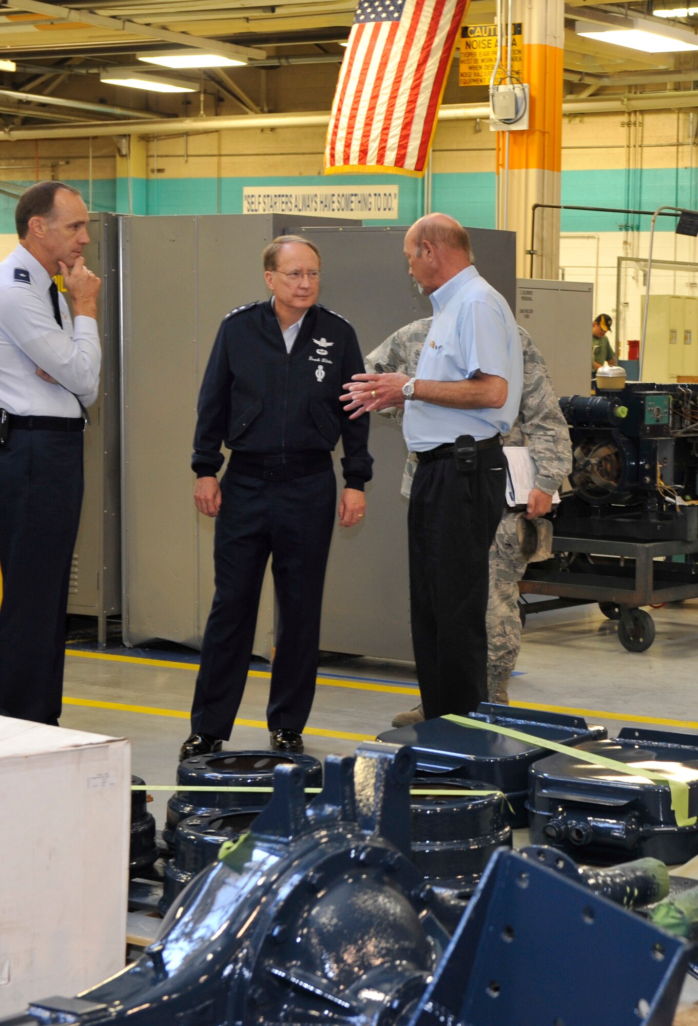 HILL AIR FORCE BASE, Utah -- Lt. Gen. Frank Klotz (center), Air Force Global
Strike Command commander, is briefed by Brig. Gen. John Cooper (left), 309th
Maintenance Wing commander, and Mr. Jay Parkin, 581st Missile Maintenance
Squadron director, on the depot maintenance schedule for the squadron's
transporter erector program here June 16. In addition to touring select
facilities, General Klotz was the keynote speaker at the Air Force
Association's Annual Focus on Defense Symposium, with this year's theme
titled "Stand Up of Global Strike Command-An Air Force Opportunity."  (U.S.
Air Force photo/James Arrowood)
