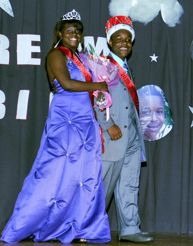JOINT BASE ANDREWS, Md. -- Zithri Wiggins, 13, and James Kennedy, 15, perform their reigning walk as the newly crowned Mr. and Miss Teen Andrews during a pageant and talent contest at the Community Airmen’s Center here June 12.  Zithri is the daughter of retired Maj. Joseph Wiggins. James is the son of Tech. Sgt. Pitman Kennedy, 779th Aerospace Medicine Squadron Aeromedical clerk. (U.S. Air Force photo by Bobby Jones)