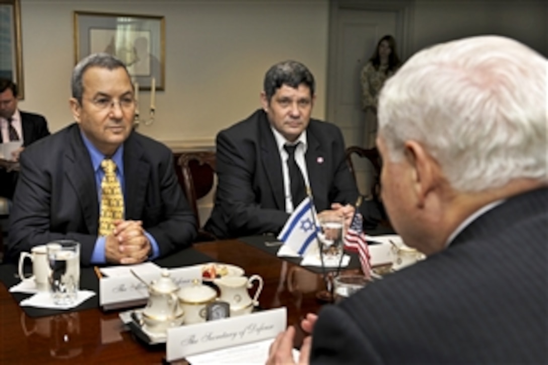Israeli Defense Minister Ehud Barak, left, meets with U.S. Defense Secretary Robert M. Gates, right foreground, to discuss mutual security issues at the Pentagon, June 21, 2010. Joining Barak is his personal chief of staff, Yoni Koren.  