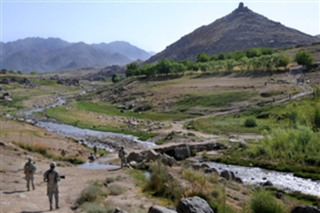 U.S. Army soldiers patrol the area surrounding Forward Operating Base Baylough in Zabul province, Afghanistan, June 18, 2010. The soldiers are assigned to Company D, 1st Battalion, 4th Infantry Regiment, U.S. Army Europe.