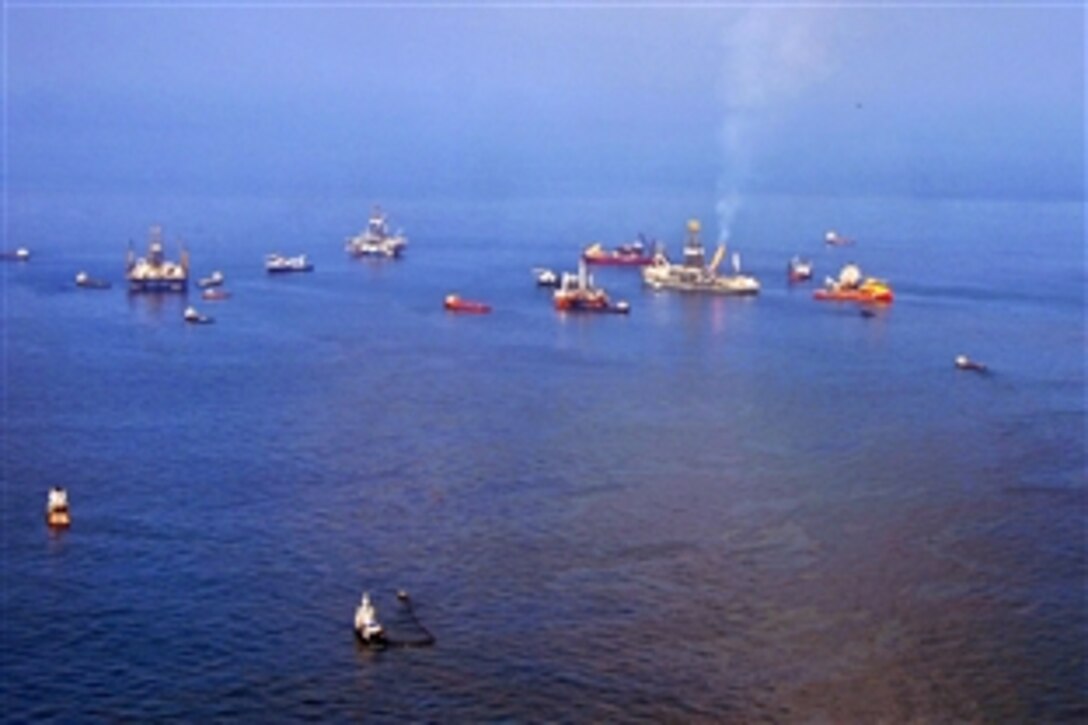 Vessels work around the clock to clean the Gulf of Mexico from the crude oil spewing from the BP Deepwater Horizon off Biloxi, Miss., June 12, 2010.