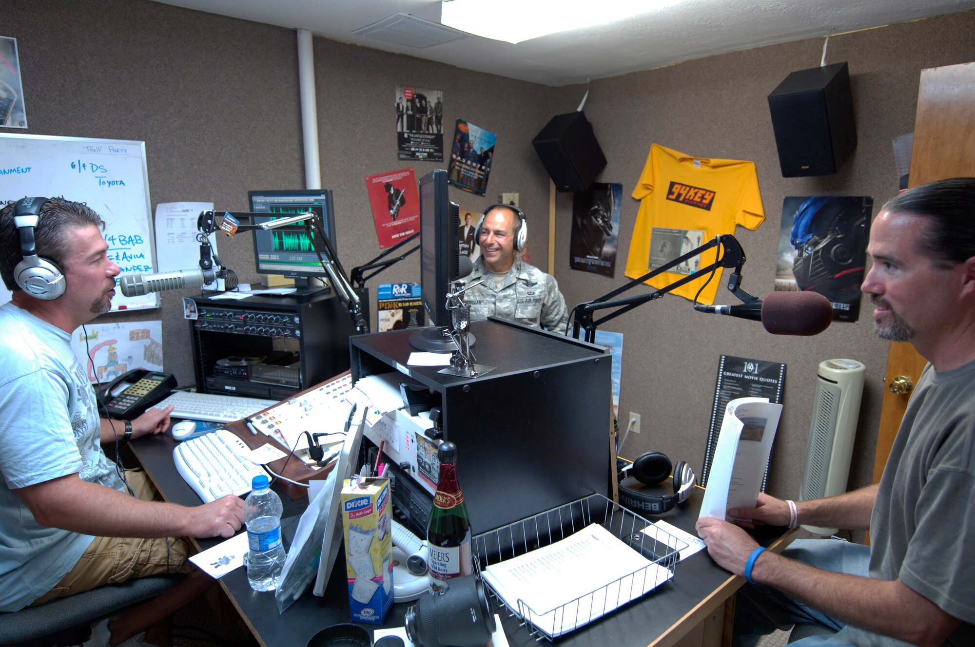 HOLLOMAN AIR FORCE BASE, N.M. -- Col. Jeff Harrigian, 49th Fighter Wing commander, takes part in his last "Commander's Corner" at 94 KYEE-FM with radio personalities Double J (James White) and Mike Mason. The June 11, 2010 show was the last for both Colonel Harrigian and Double J. Next month's "Commander's Corner" will be hosted by the new 49th Wing commander Col. David Krumm and Mason. The radio show is a monthly event hosted by the commander and the 94 KYEE morning personality and provides listeners with updates on what is taking place at Holloman, while also allowing them to call-in and ask questions. (U.S. Air Force photo by Mr. Arlan Ponder / Released)  