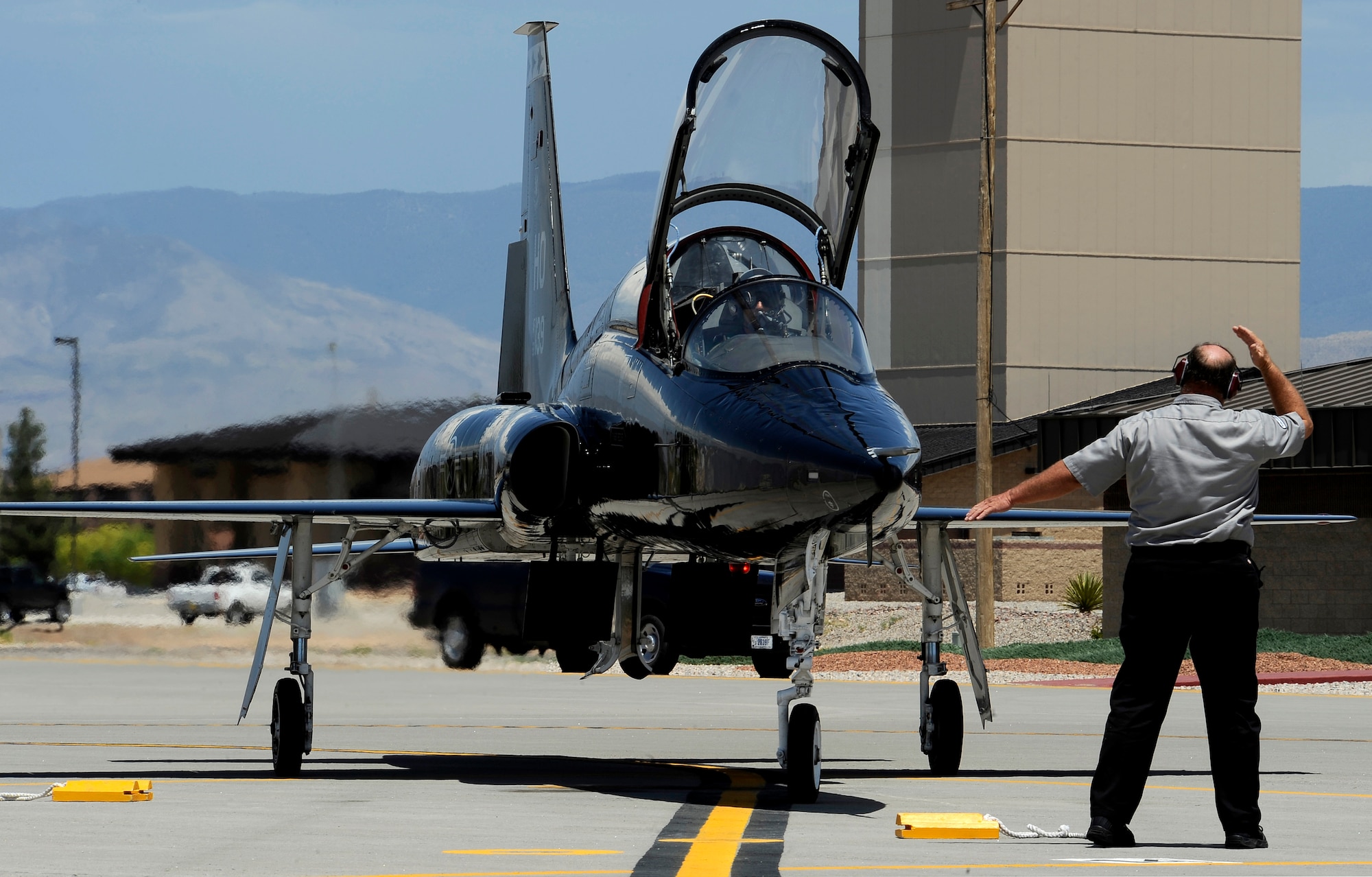 HOLLOMAN AIR FORCE BASE, N.M. -- Col. Jeff Harrigian taxis in, June 21, 2010, after his final flight in a T-38 Talon aircraft as the 49th Fighter Wing commander. Colonel Harrigian arrived at Holloman in January 2008 and is a command pilot with more than 3,900 flight hours. (U.S. Air Force photo by Senior Airman Veronica Stamps / Released)