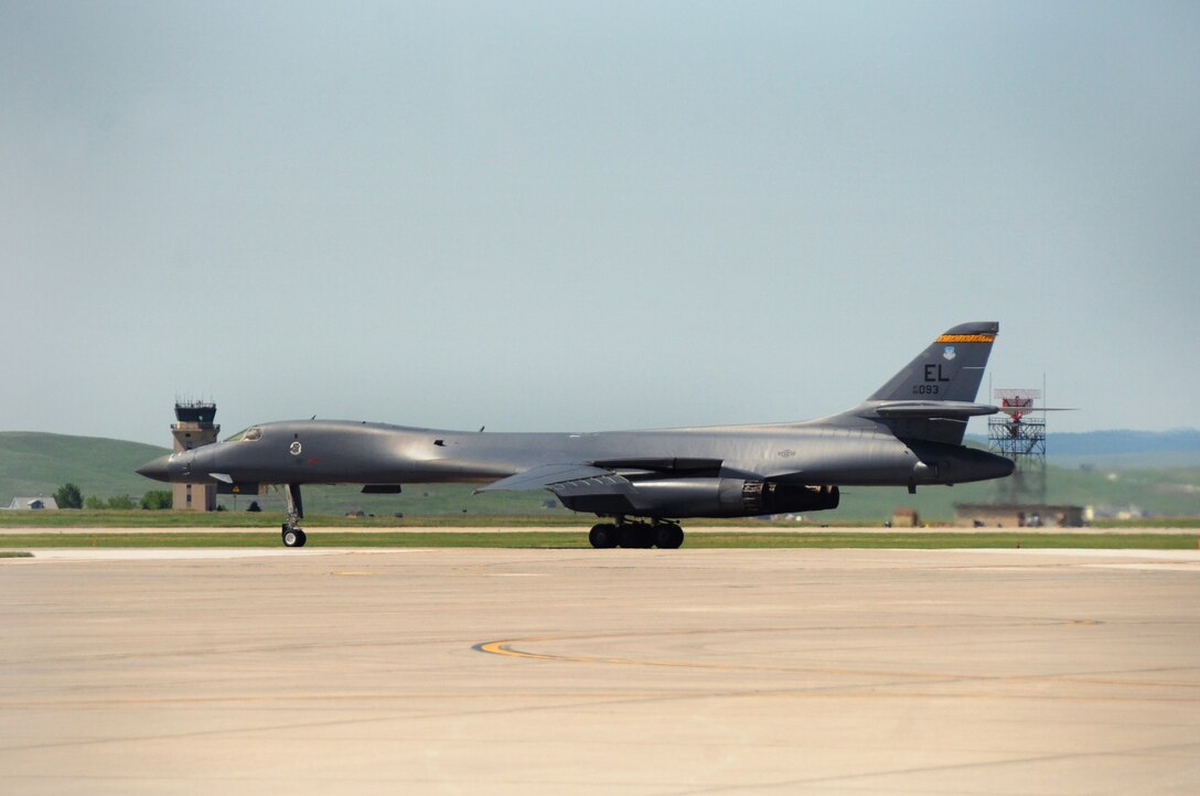 ELLSWORTH AIR FORCE BASE, S.D. -- A B-1B Lancer from the 37th Bomb Squadron, taxis out to the runway before take-off, June 22.  Carrying the largest payload of both guided and unguided weapons in the Air Force inventory, the multi-mission B-1 is the backbone of America's long-range bomber force. (U.S. Air Force photo/Airman 1st Class Anthony Sanchelli)

