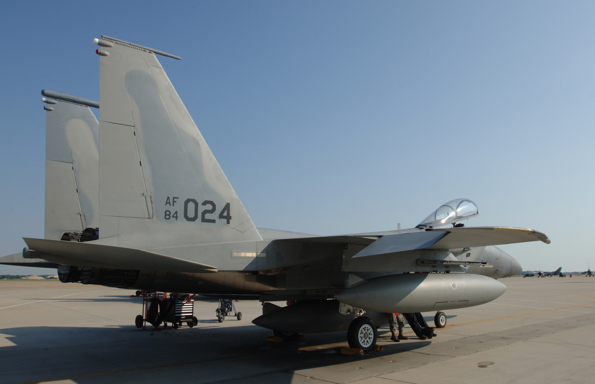 LANGLEY AIR FORCE BASE, Va. -- F-15 Eagle tail number 84-024 from the 71st Fighter Squadron sits on the flight line prior to its transfer to Nellis Air Force Base, Nev., June 21. The fighter is one of the first two Eagles to be transferred to other units due to the impending inactivation of the 71 FS. The tail is devoid of the 71 FS’ trademark red “Ironmen” stripe and iconic “FF” marking. (U.S. Air Force photo/Airman 1st Class Jason J. Brown)