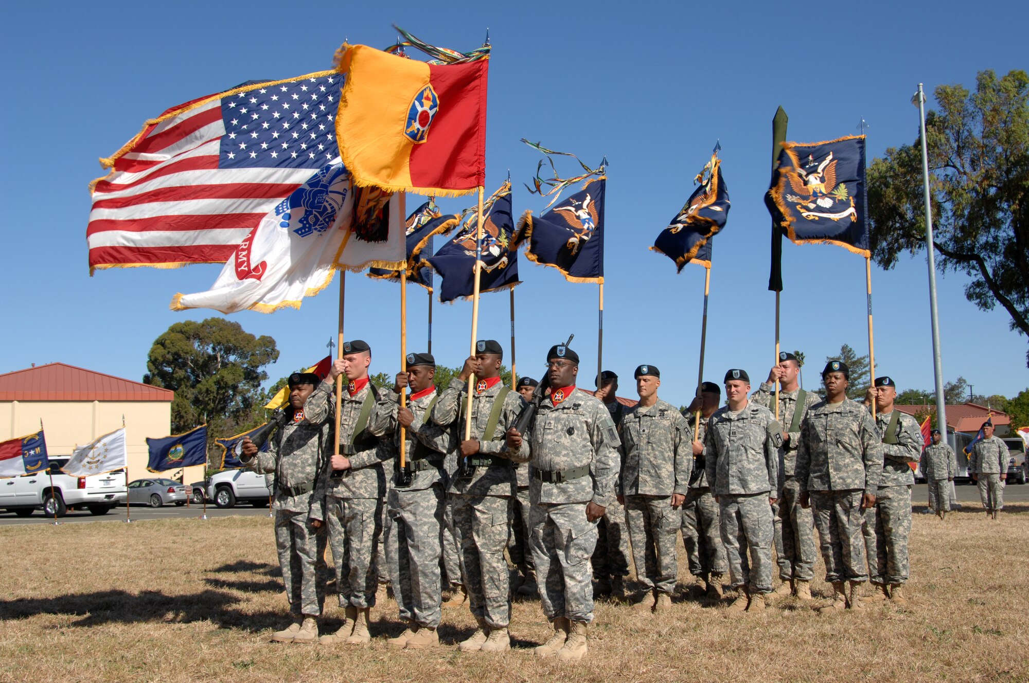 Members of the 402nd Field Artillery Brigade stand at attention during the brigade’s Casing Ceremony at Travis Air Force Base, Calif. June 11.  (U.S. Air Force photo by Civ/Nan Wylie)