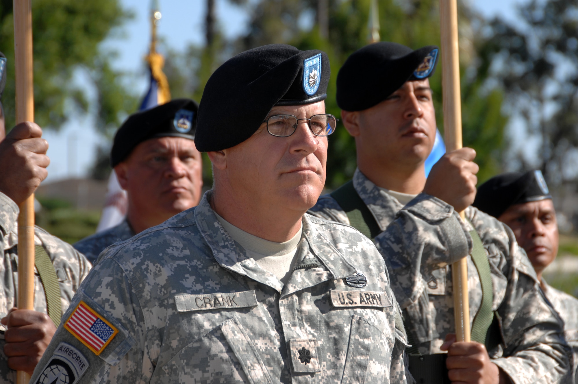 Lt. Col. Quentin Crank, commander of the 2/363rd Training Support Squadron, takes part in the 402nd Field Artillery Brigade Casing Ceremony at Travis Air Force Base, Calif. June 11.  (U.S. Air Force photo by Civ/Nan Wylie)