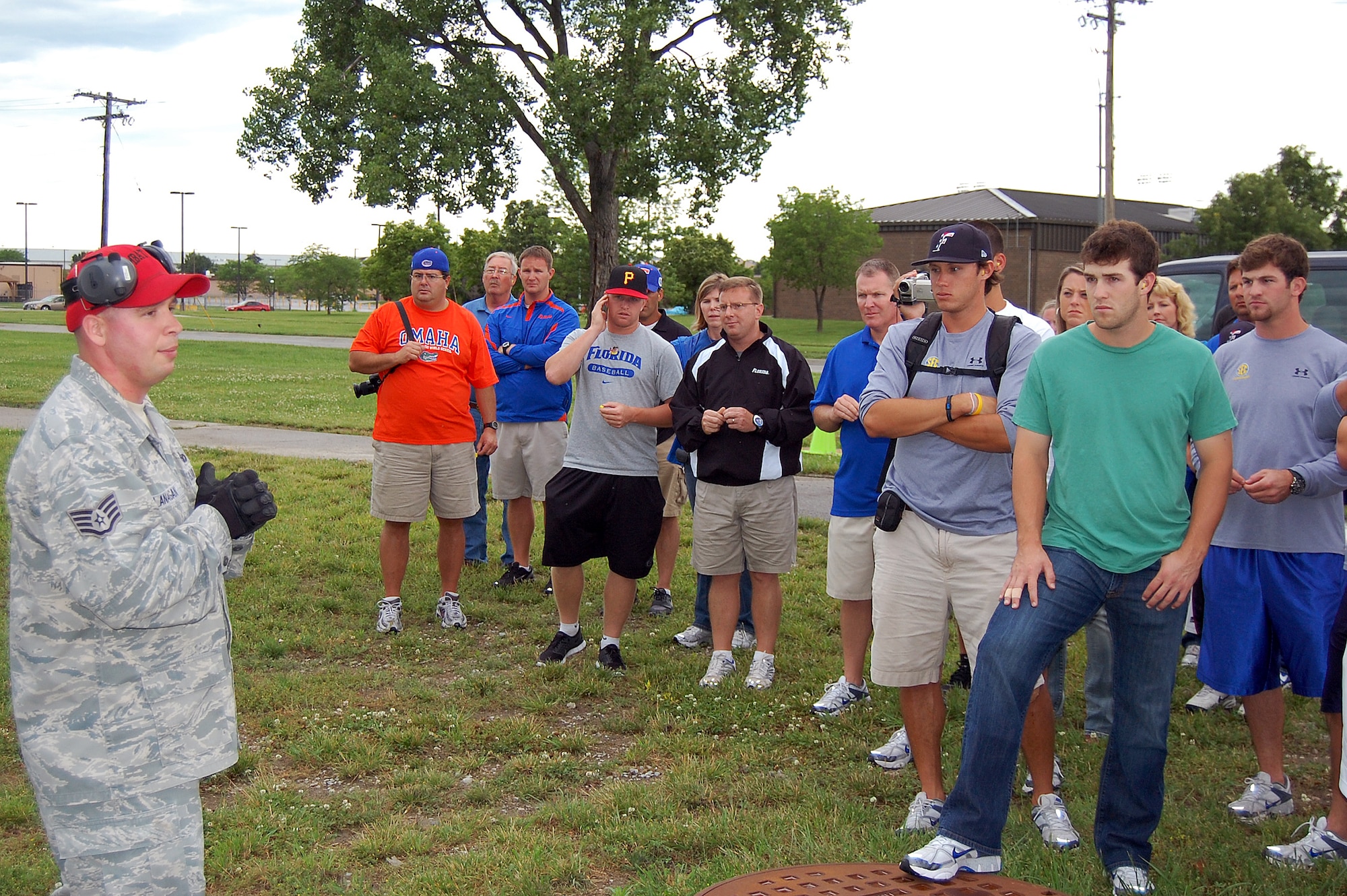 OFFUTT AIR FORCE BASE, NE. - Staff Sgt. Brian Flanagan, a 55th Security Forces Squadron combat arms instructor, briefs members of the University of Florida Gators baseball team before giving them a weapons demonstartion June 20. As the official sponsor of the Gators for the 2010 College World Series, 55th Wing members treated the team to a base tour, a weapons demonstration and barbecue dinner at the Community Center.  U.S. Air Force photo by 1st Lt. Kenneth Scholz 