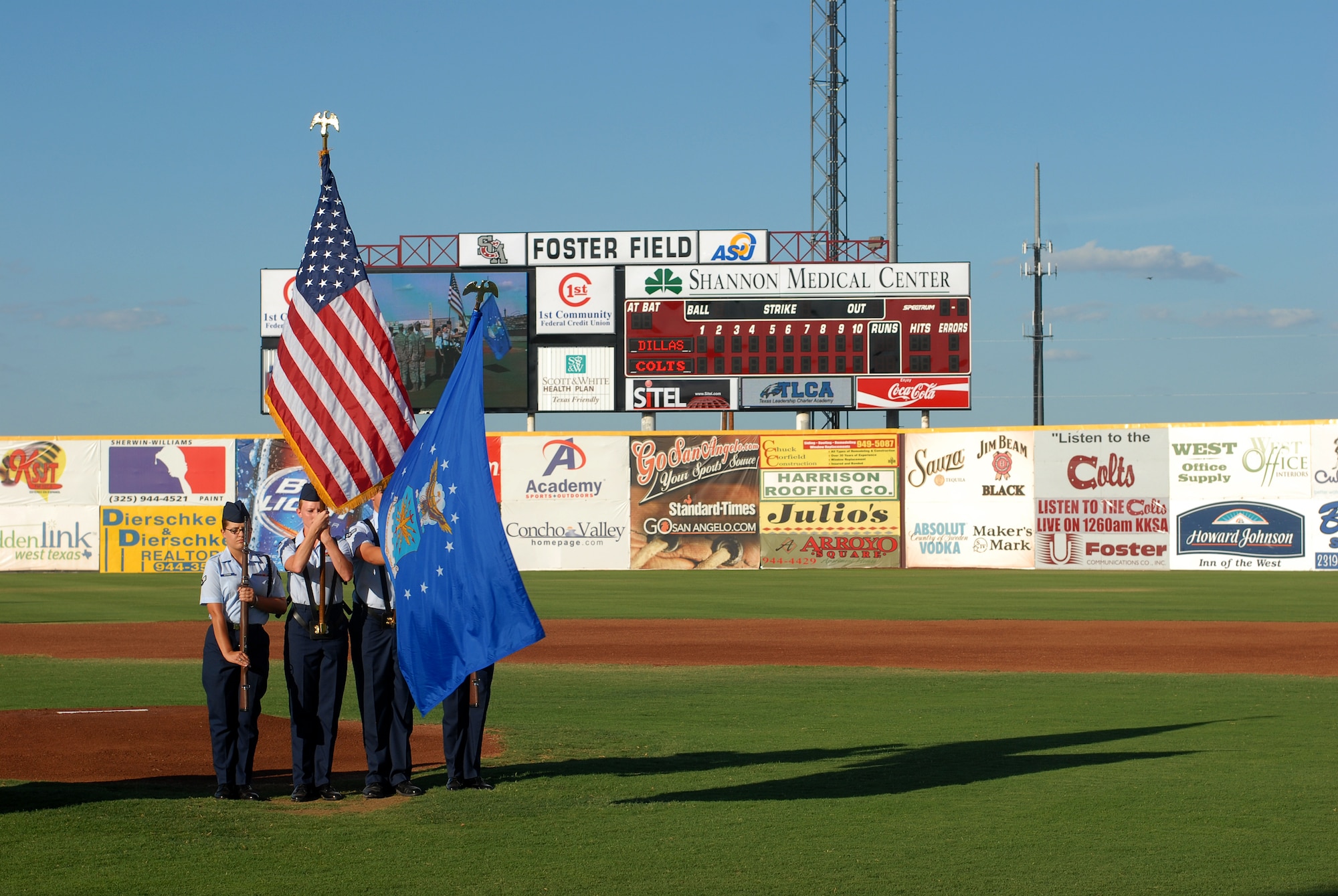 The 17th Training Group Drill and Ceremony Black Rope team post the Colors at the beginning of the San Angelo Colts United League baseball team game against the Rio Grande Valley White Wings June 18.  The Colts held a military appreciation night honoring the men and women of Goodfellow AFB, TX. (U.S. Air Force photo/Master Sgt Randy Mallard)