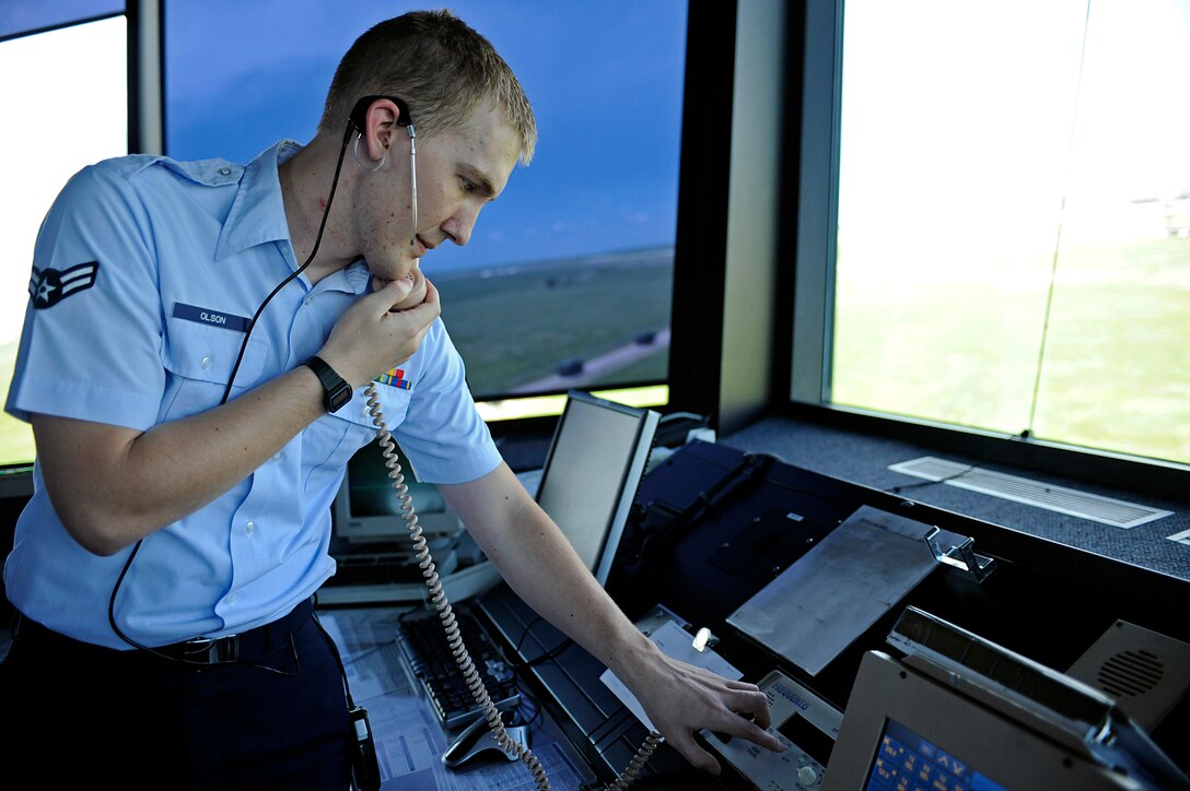 ELLSWORTH AIR FORCE BASE, S.D. – Airman 1st Class William Olson, 28th Operations Support Squadron air traffic controller, records an automated terminal information service message at the control tower, June 21. The ATIS message is pre-recorded and gives pilots information they may need to know during a mission. (U.S. Air Force photo/Airman 1st Class Matthew Flynn)