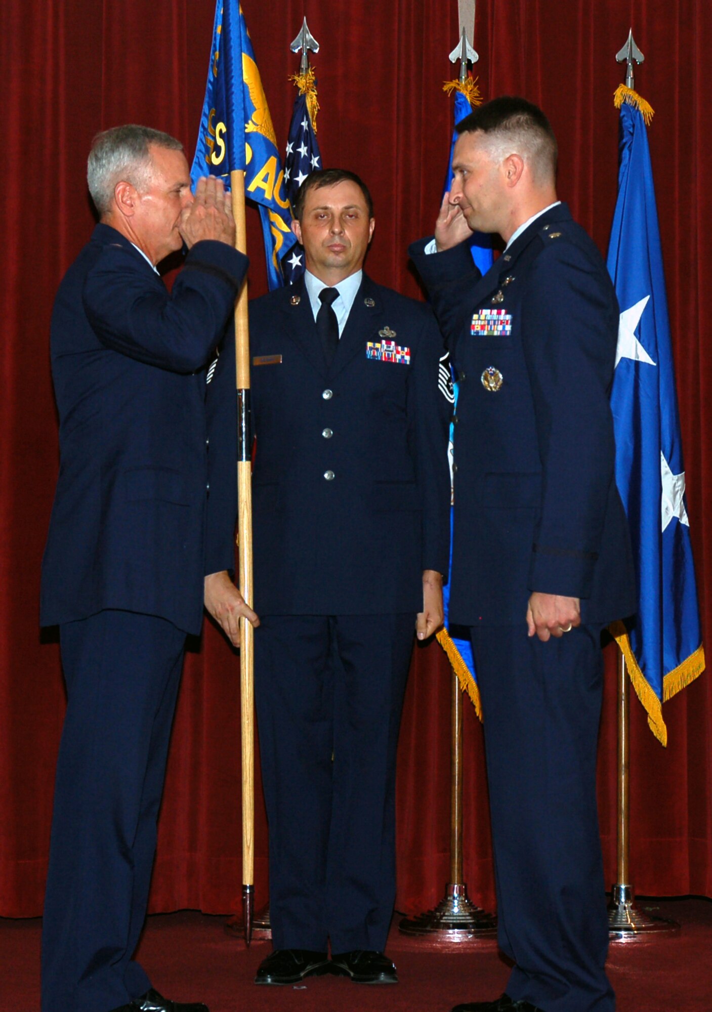 BARKSDALE AIR FORCE BASE, La. - Maj. Brett NeVille assumed command of the 608th Air Communications Squadron from Maj. Gen. Floyd Carpenter, Eighth Air Force commander, during a change-of-command ceremony June 18 in the Stripes Club Ballroom at Barksdale Air Force Base, La. Major NeVille is also the Headquarters Eighth Air Force Director of Communications and Information. Major NeVille took command of the 608th ACOMs from Lt. Col. Michael Haddock. (U.S. Air Force photo by Staff Sgt. Brian Stives)