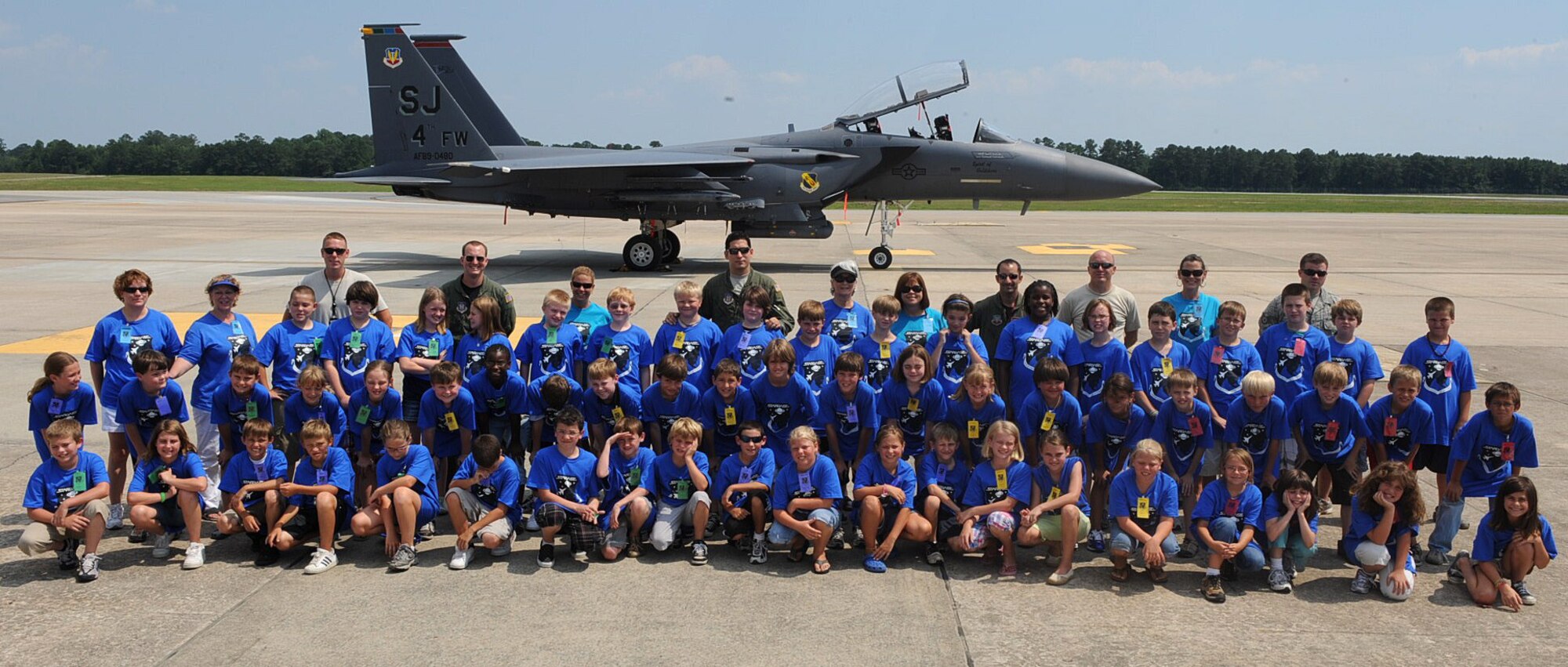 SEYMOUR JOHNSON AIR FORCE BASE, N.C. – Students and volunteers commemorate the first day of their Science and Technology Academies Reinforcing Basic Aviation and Space Exploration experience here June 21, 2010. The STARBASE program is a week-long immersion course in science and math studies for fifth graders. The students visit the base for a week to learn about topics ranging from compass reading to tools used for weather prediction and will witness the laws of motion in action. (U.S. Air Force photo/Senior Airman Gino Reyes)