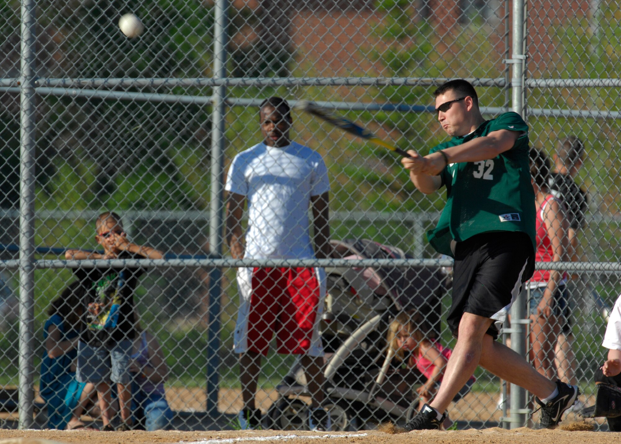 MINOT AIR FORCE BASE, N.D. -- Staff Sgt. James Force, 5th Security Forces Squadron Charlie flight response force leader, hits the ball to left field here June 16. The 5th SFS Charlie flight crushed the 5th Medical Operations Squadron team 15-6. (U.S. Air Force photo by Senior Airman Ashley N. Avecilla)