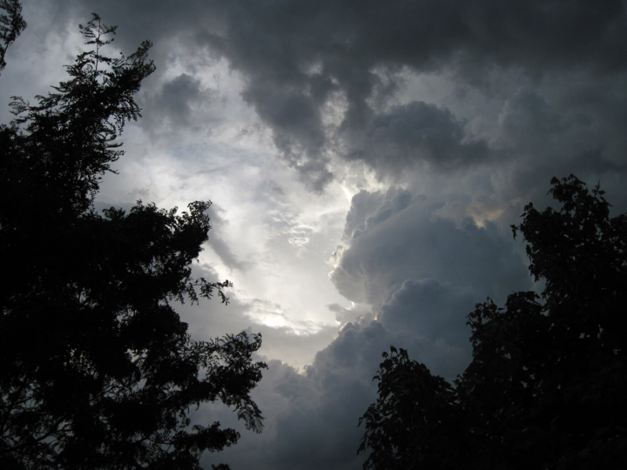 GRISSOM AIR RESERVE BASE, Ind., -- A ray of sunlight tries to break through the heavy cloud formations that hung over Grissom ARB.  Heavy rain and thunderstorms have been numerous during the past week in the North Central Indiana region.  (U.S. Air Force photo/Mr. Robert Wydock)                               