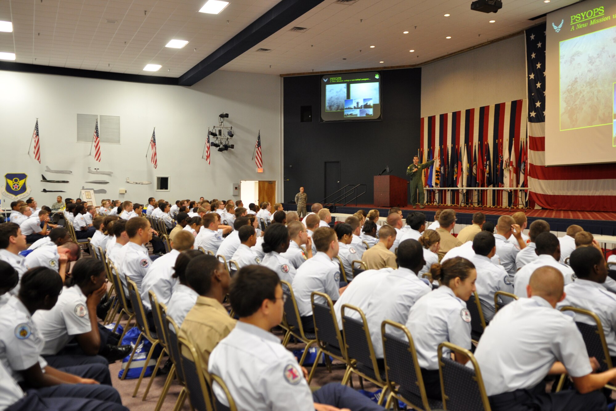 Maj. Harry Dyson, director of staff, 2nd Bomb Wing, gives a mission brief to 166 JROTC cadets and Young Marines from surrounding state high schools in Hoban Hall at Barksdale Air Force Base La., June 17, 2010. Airmen from over 40 Air Force Specialty Codes (AFSC) at Barksdale were represented during the JROTC Open House to explain career options to the cadets. An AFSC is an alphanumerical code used by the United States Air Force to identify an Air Force Specialty (AFS) or in layman’s term, a type of job or career field. (U.S. Air Force photo/Tech. Sgt. Jeff Walston) 