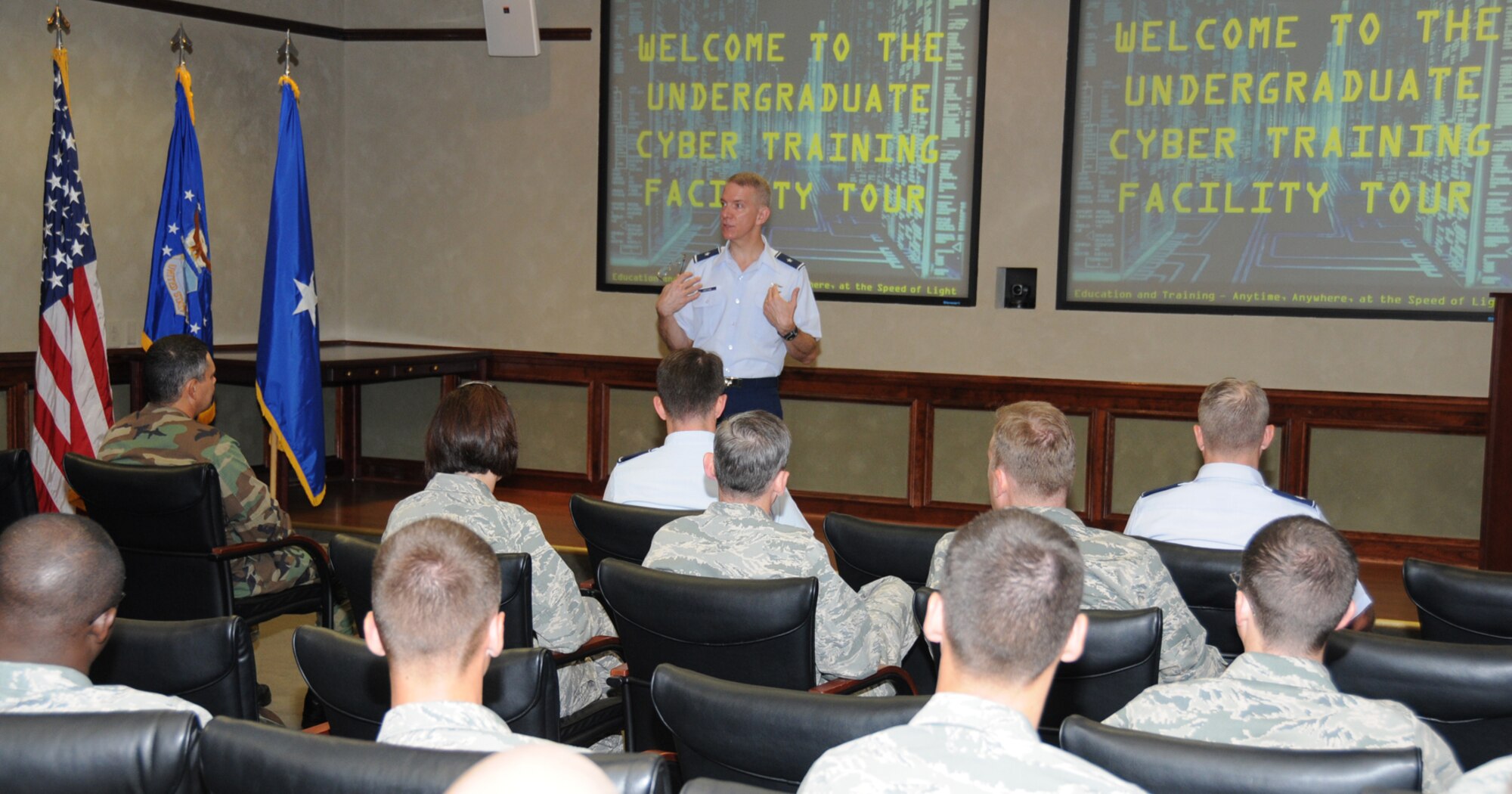 Brig. Gen. David Cotton welcomes the 16 students in Keesler’s first undergraduate cyber training class that began Tuesday.  A ribbon cutting ceremony for the undergraduate cyber training schoolhouse in the 333rd Training Squadron was held Monday in Stennis Hall.  General Cotton is the Director of Cyberspace Operations, Office of Information Dominance and Chief Information Officer.  Up to 400 military members, civilians and international students are expected to complete the course each year.  (U.S. Air Force photo by Kemberly Groue)