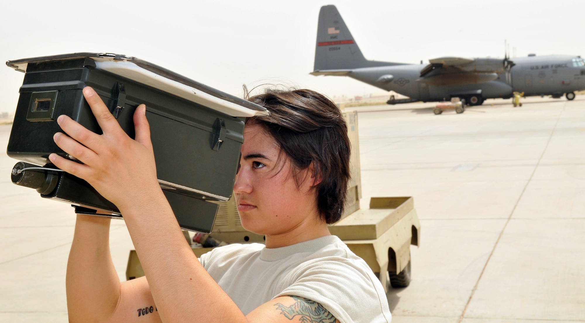Senior Airman Jennifer Sonnamaker, 777th Expeditionary Airlift Maintenance Unit communications and navigations technician, interrogates an identification friend or foe antenna on a C-130 Hercules June 18, 2010, Joint Base Balad, Iraq. IFF is a system used to identify a friendly force’s aircraft, vehicles or ships. Airman Sonnamaker is deployed from Little Rock Air Force Base, Ark. (U.S. Air Force photo\Staff Sgt. Phillip Butterfield) 